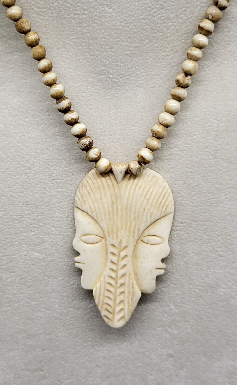 vintage 18″ bovine bone beaded necklace with double face pendant, barrel clasp