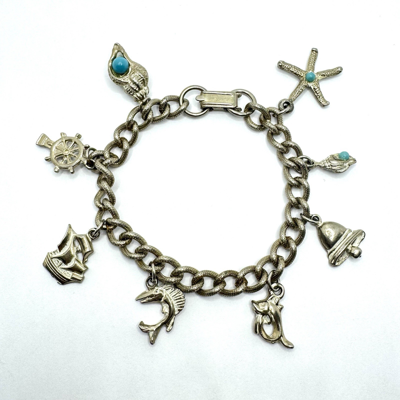 Vtg Charm Bracelet Starfish Ship Conch Shell Faux Turquoise Charms Curb Chain 7″