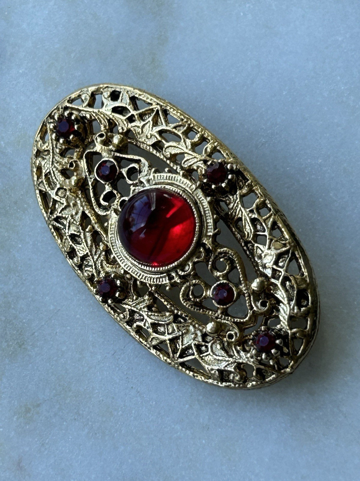 Vintage Victorian Revival Red Cabochon Rhinestone Gold Tone Filigree Brooch Pin