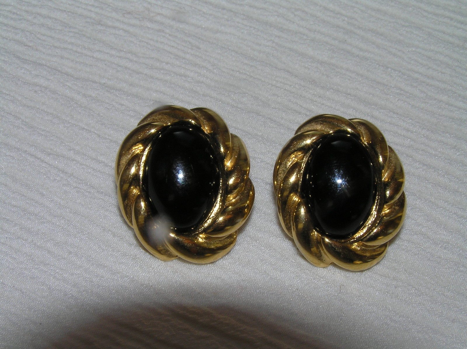 Estate KJL Signed Twist Oval Goldtone with Magnetic Black Plastic Cab Post Ear
