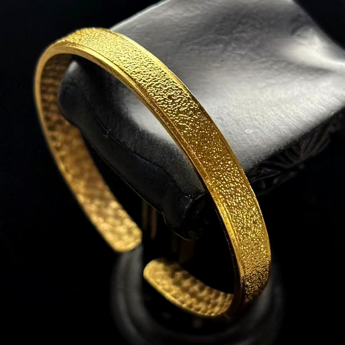 Golden Cuff Bangle Bracelet Gold-wash (NOT SURE) marked ‘999’, 7.5 in adjustable