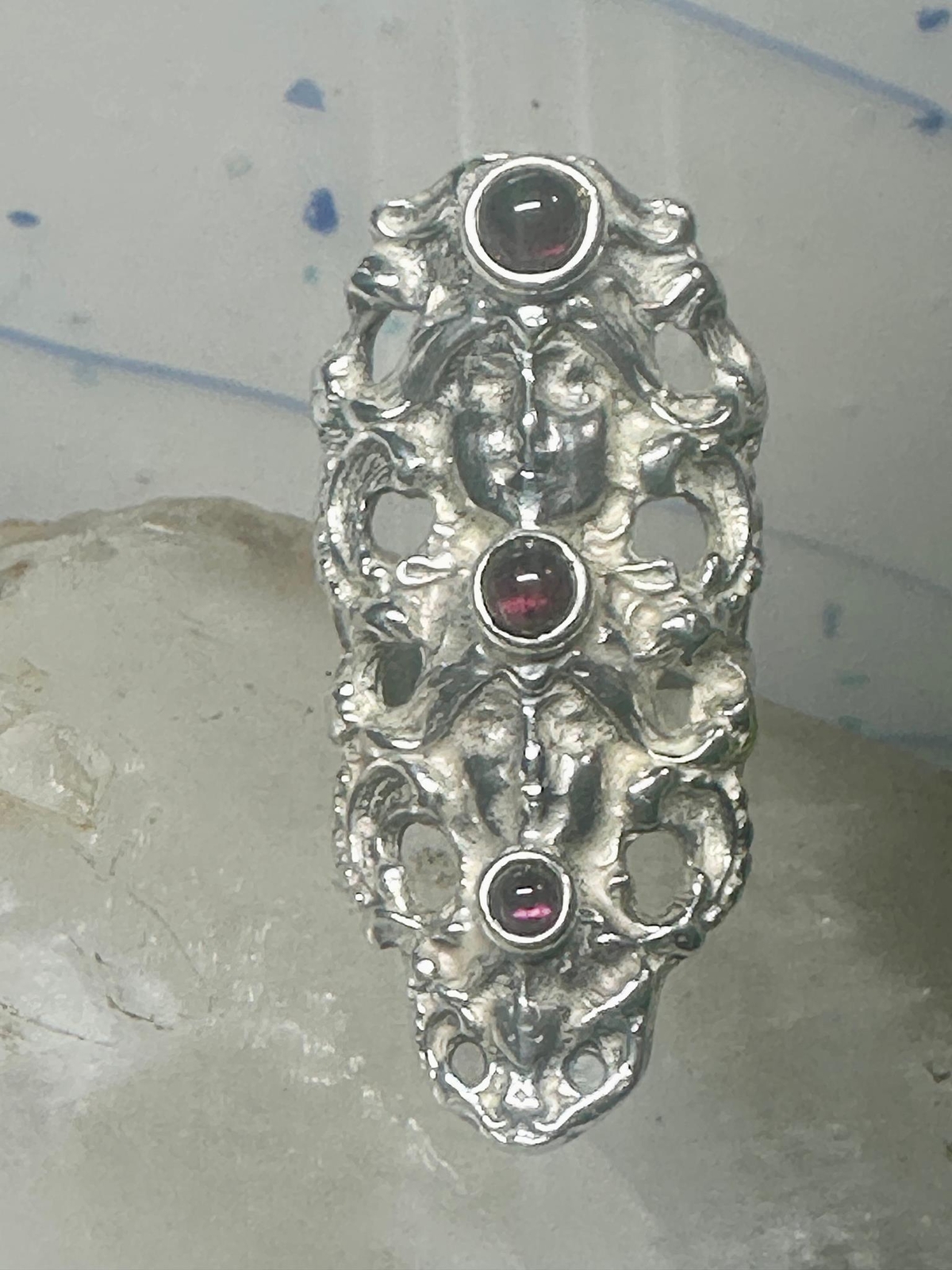 Face ring long figurative Art Deco influences garnets size 5.75 sterling silver