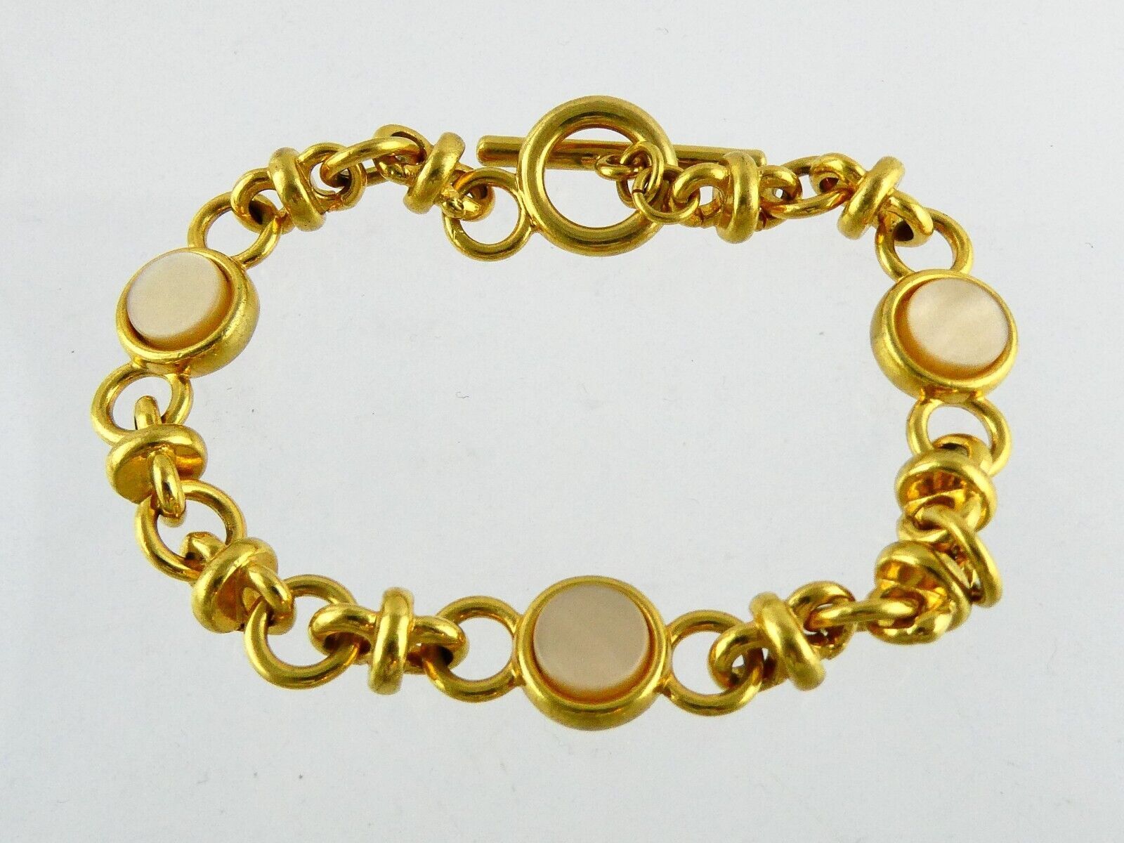 Monet Goldtone Metal and Mother of Pearl Shell Link Bracelet Toggle Clasp 7 Inch