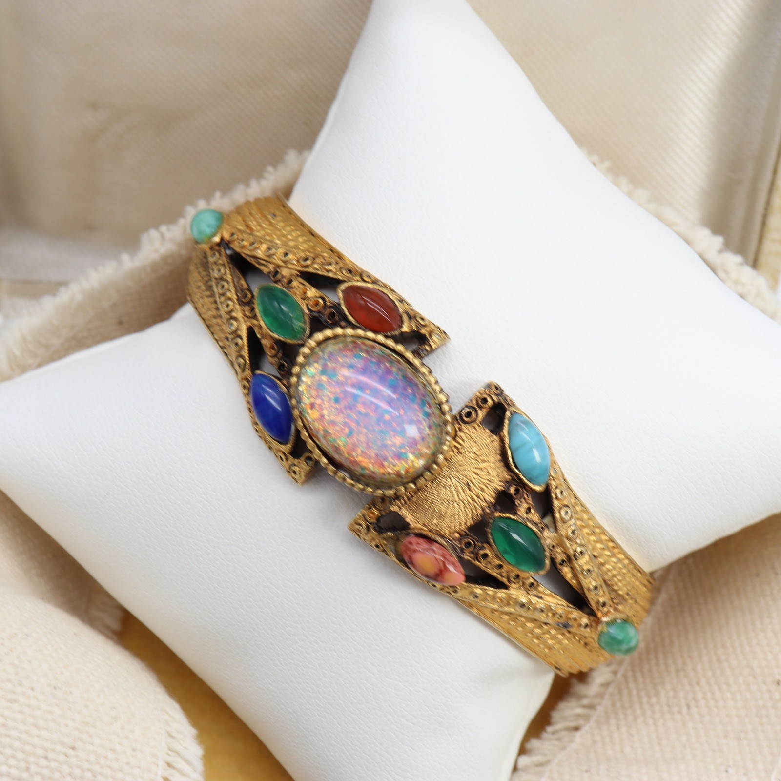 Vtg DESIRE Faux Opal Cabochon Clamper Bracelet Glass Gold Tone Hinged Pink Blue