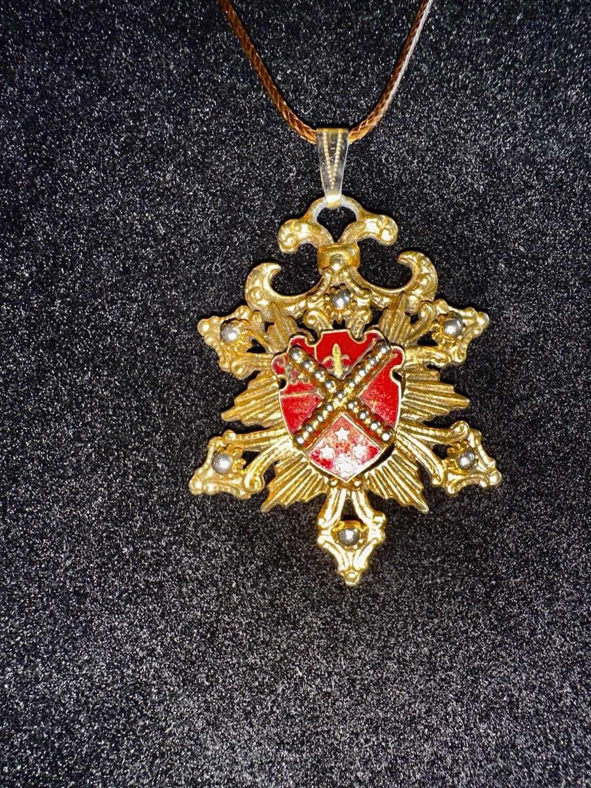 Vintage Coat Of Arms Pendant On A Brown Modern Cord Necklace Gold Tone With Red