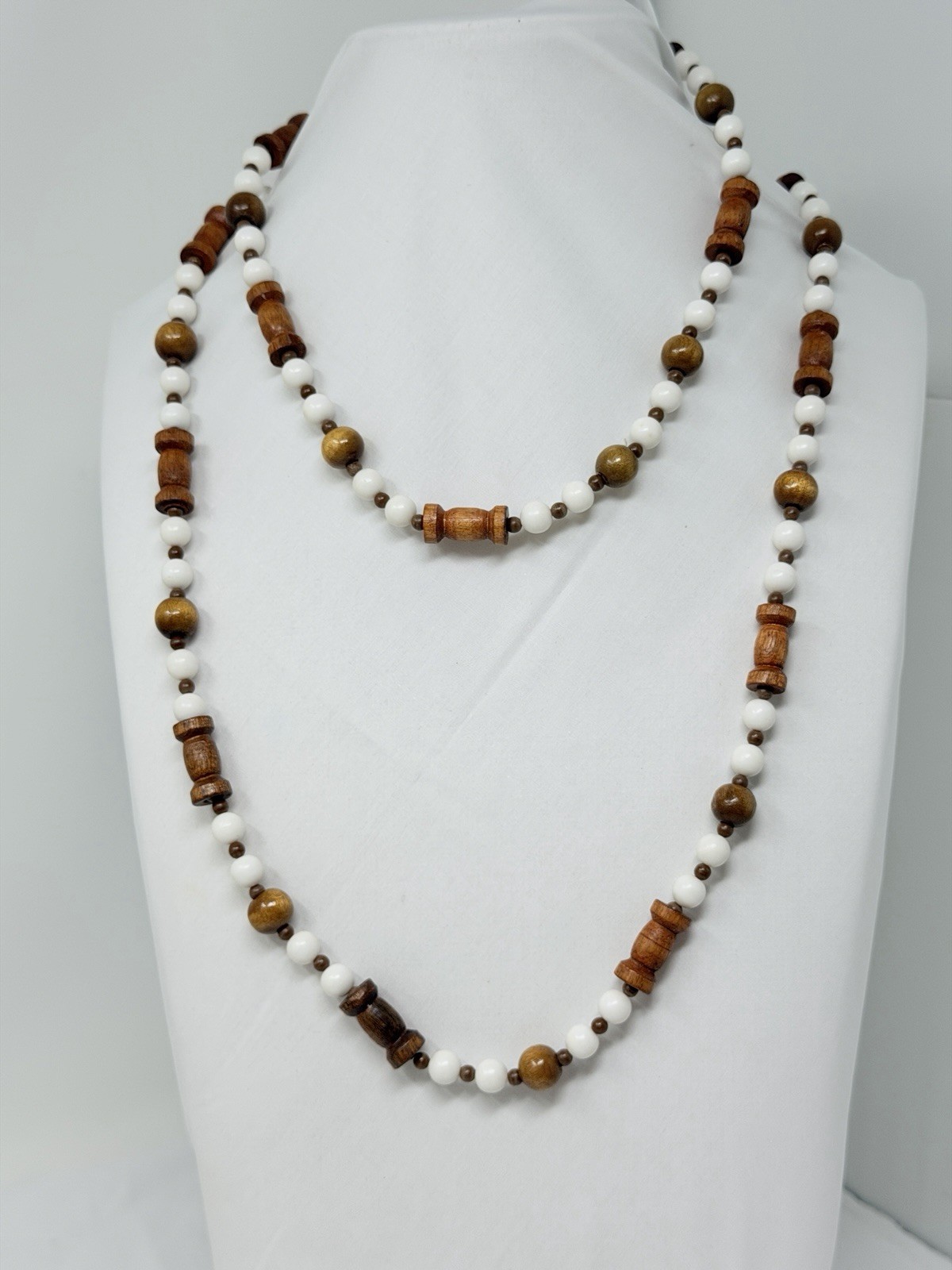 Vintage Carved Wood and White Lucite Bead 48″ Necklace