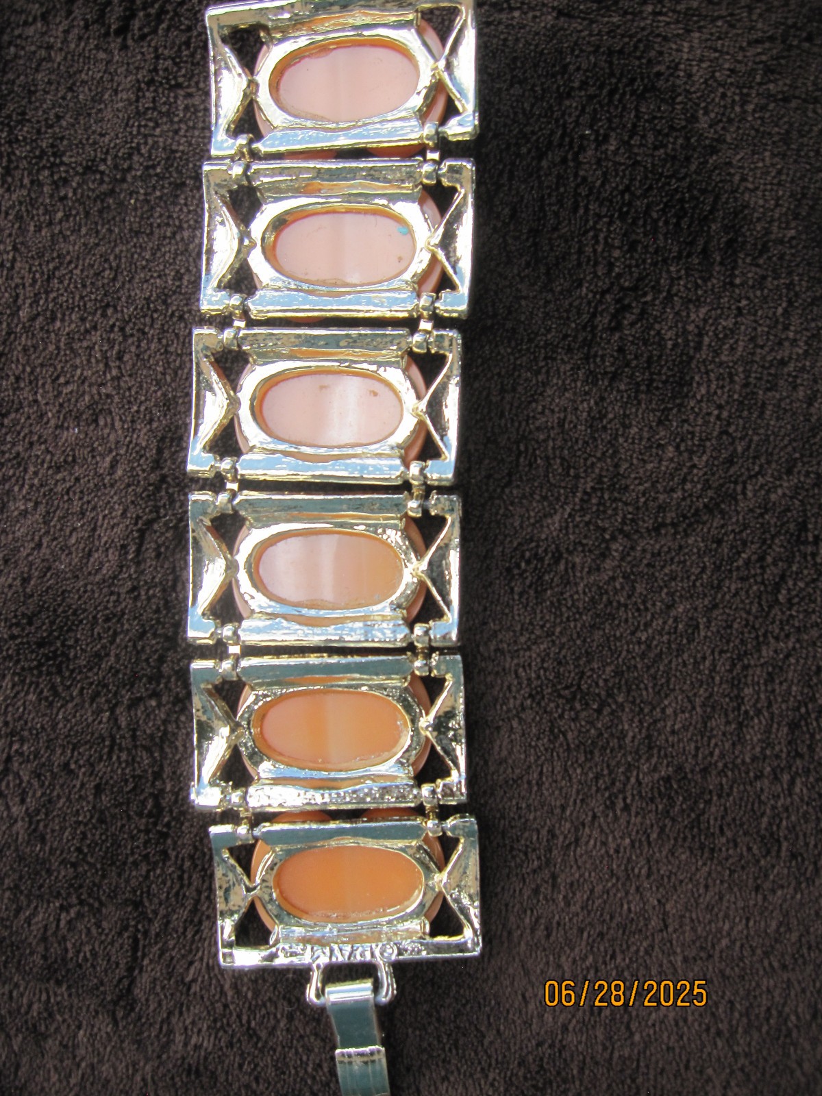 Vintage Bracelet unknown metal with orange faux stone Marked DAM