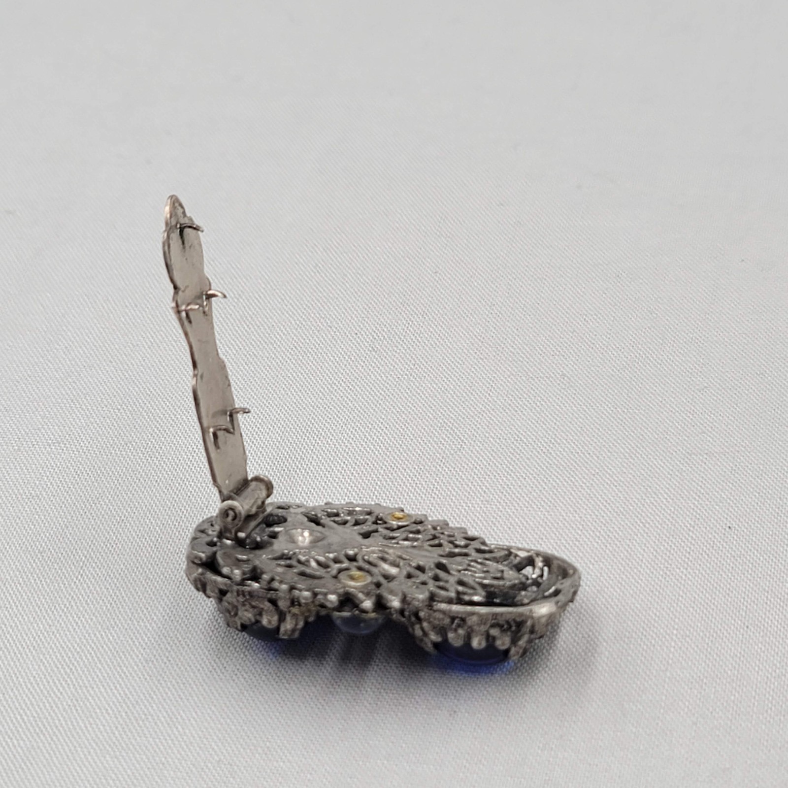 Vintage Blue Cabochon Dress Clip Dark Gray Embossed 2″