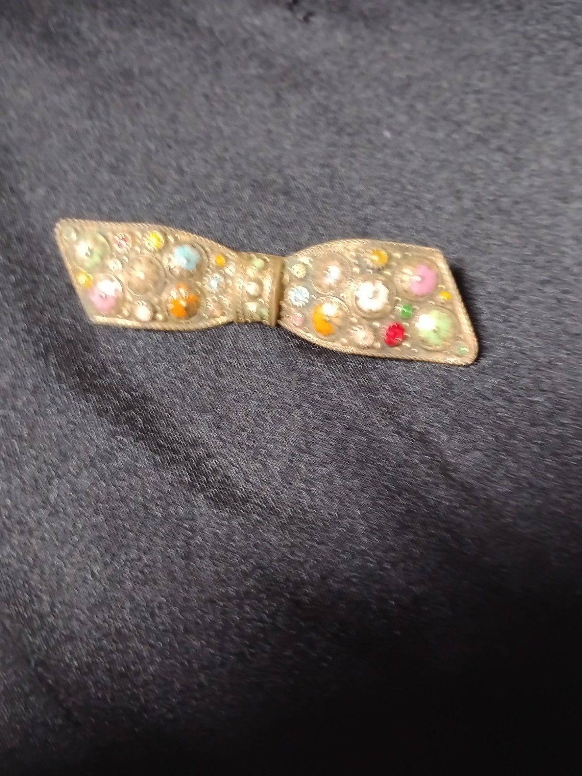 Enamel detailing on beautiful bow. C clasp. Older pin
