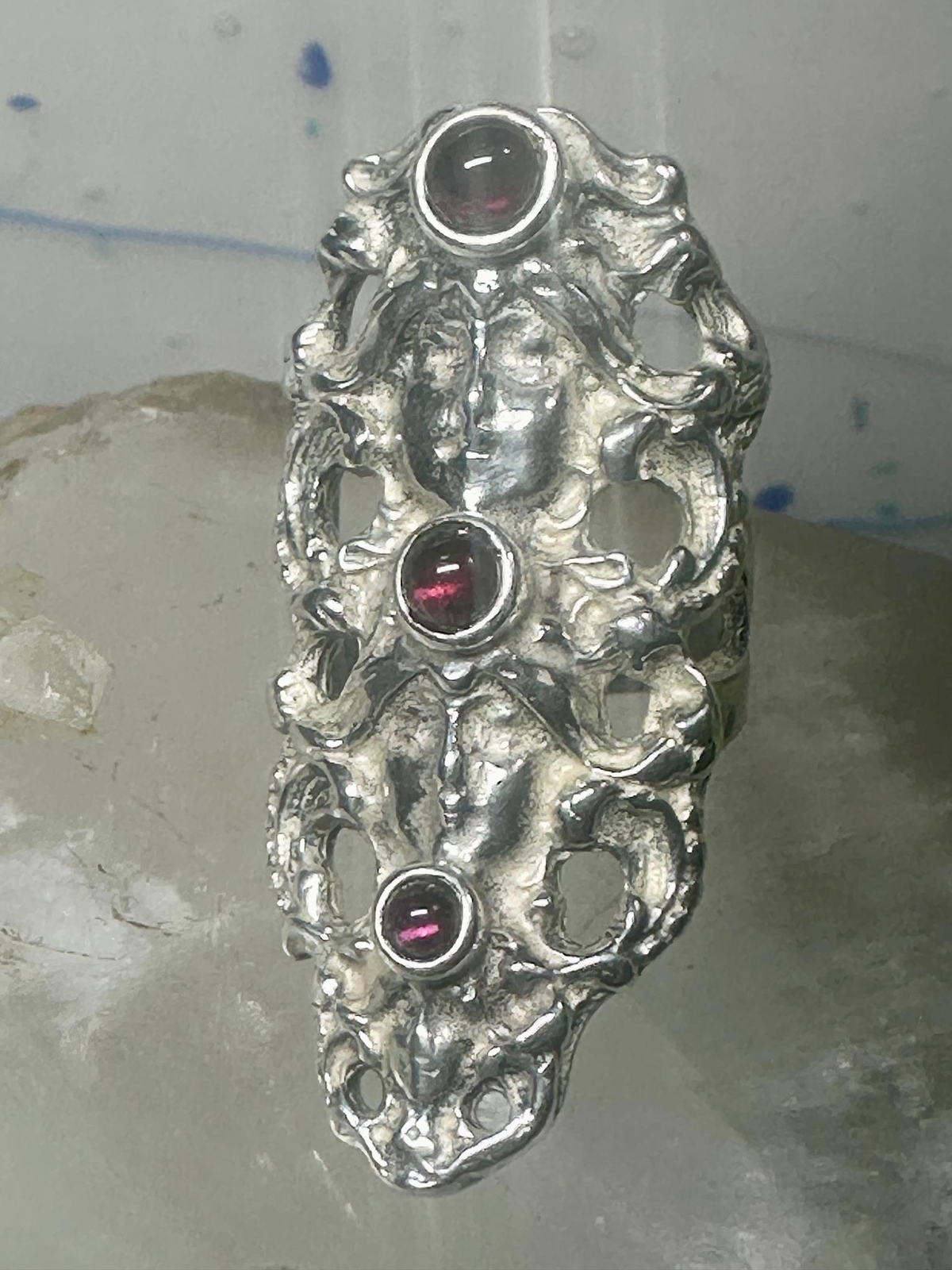 Face ring long figurative Art Deco influences garnets size 5.75 sterling silver