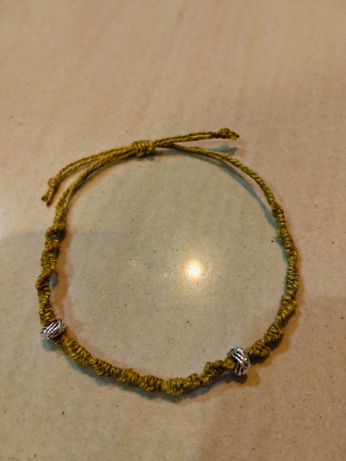 A piece Adj Hemp Bracelet with Natural Marigold & Rust Dye – Boho Style 2 beads