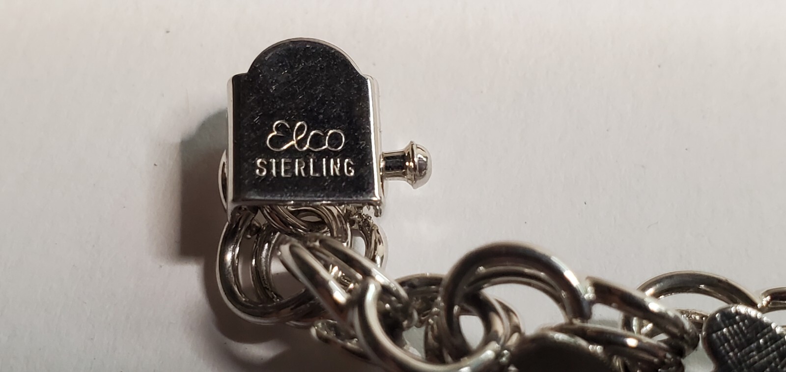 ELCO Sterling Silver 17 Charm Bracelet 64 grams – Bullhorn, Crown, Windmill
