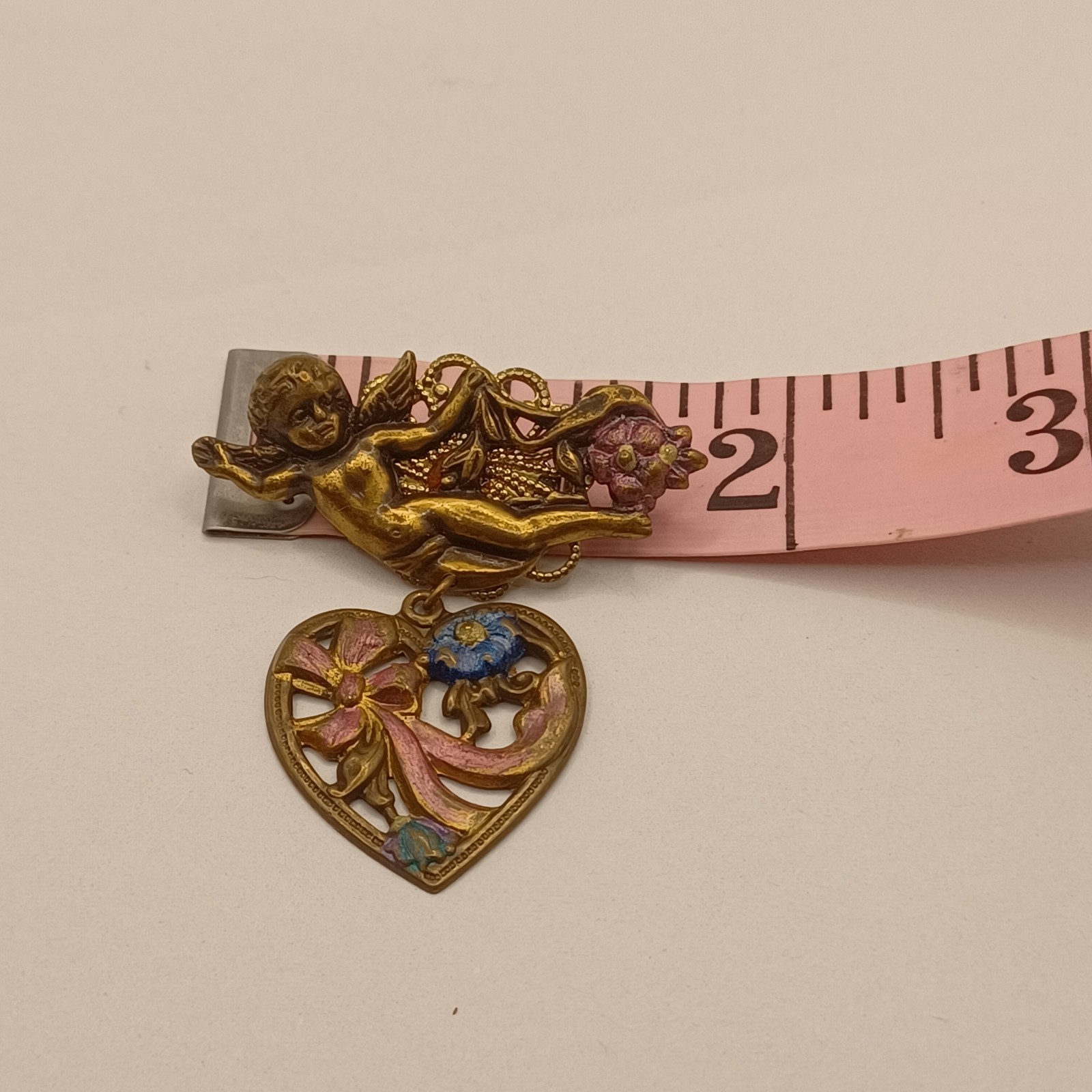Brass Cherub with Heart Dangle Purple and Blue Enamel flowers and bow Pin Brooch