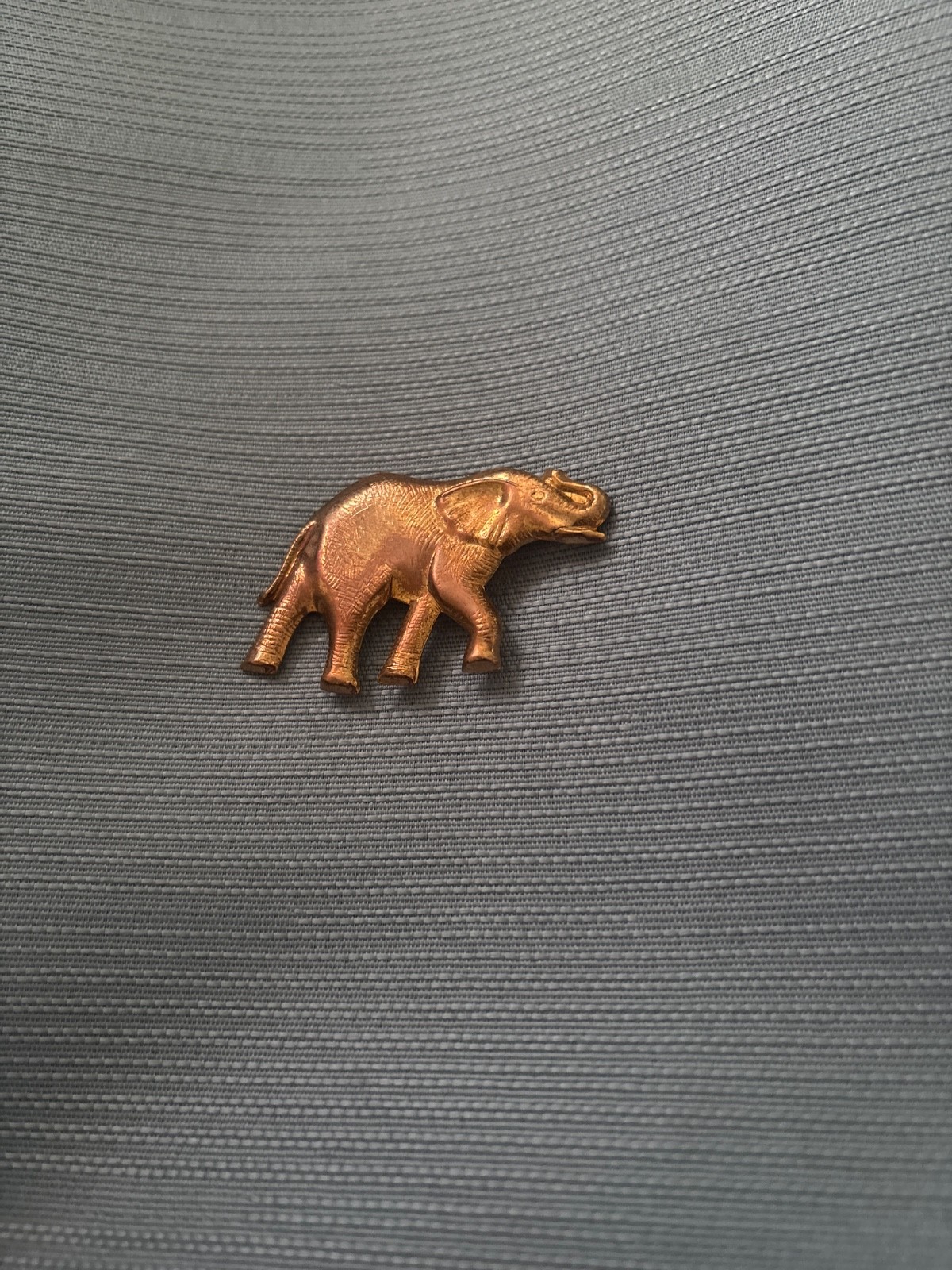 vintage medium sized gold colored metal material elephant pin