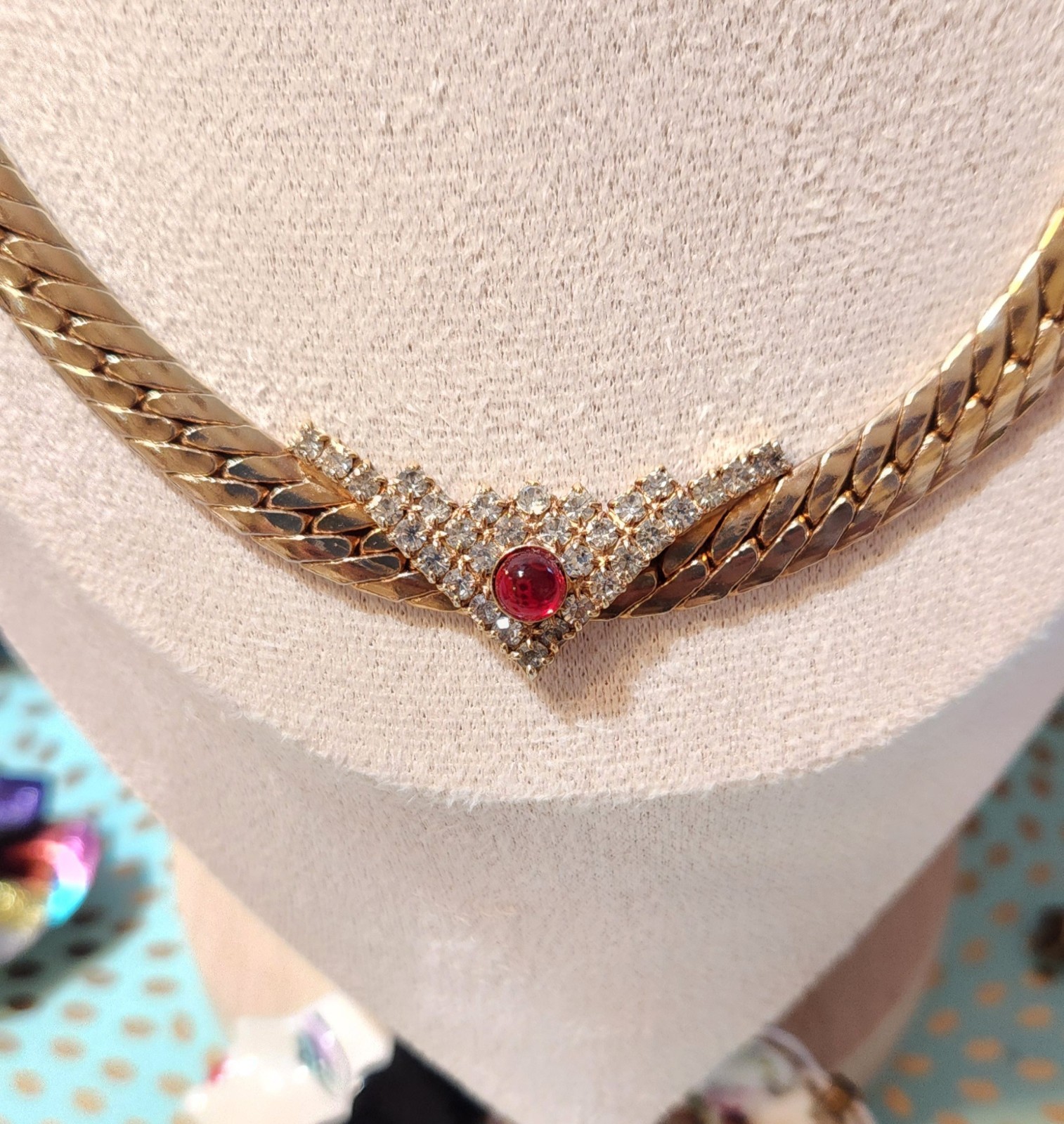 Flat Gold-toned Necklace V Shape Rhinestones Station Pendant & A Red Dot Glass
