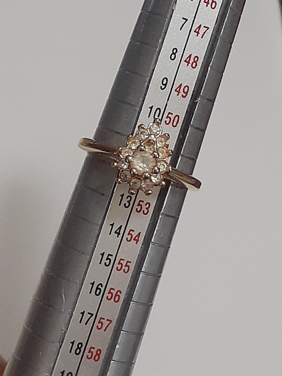 18K HGE prong set clear stone cluster ring, rosette, teardrop shape. Size 6