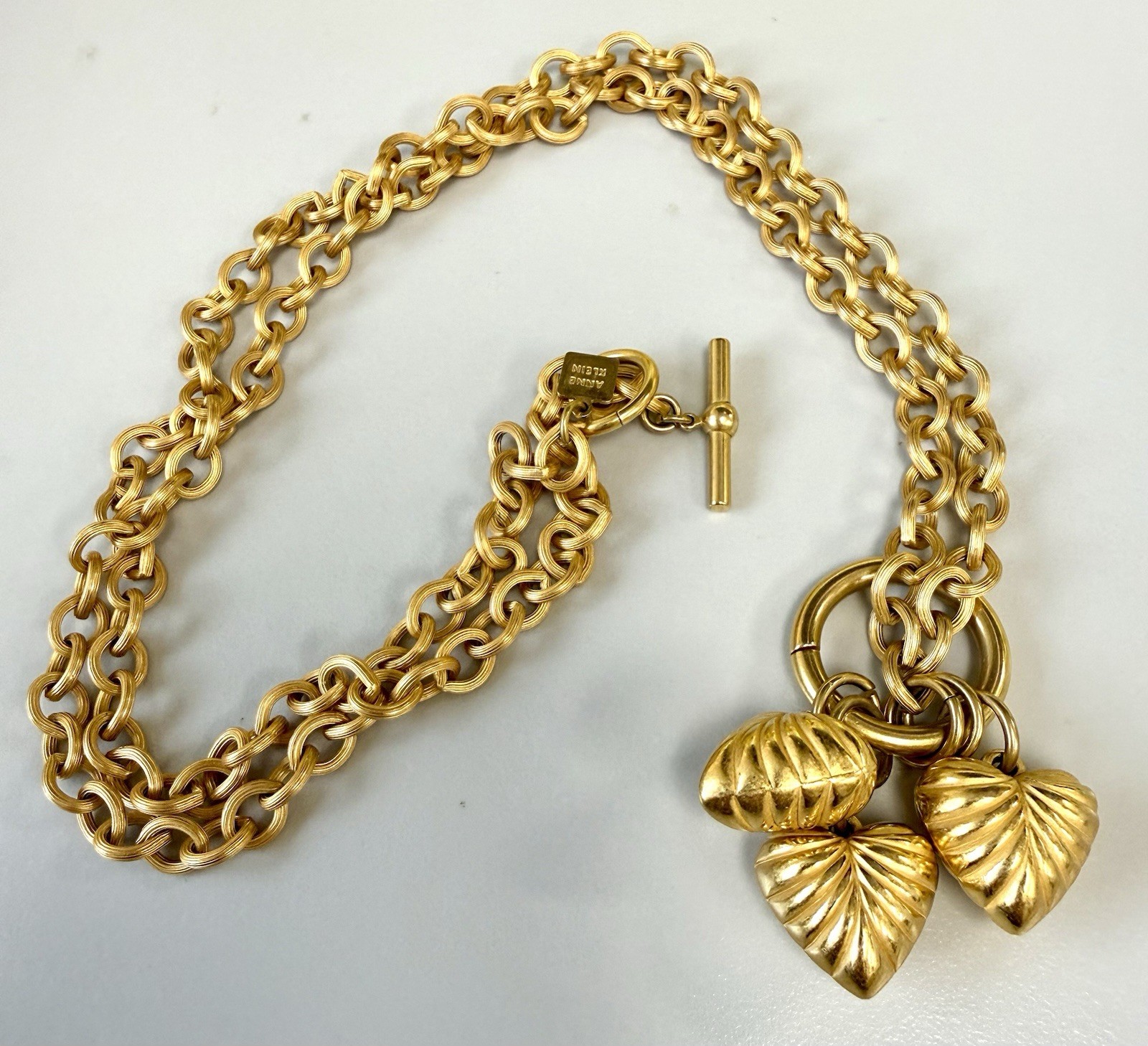 Vintage Anne Klein Gold Tone Triple Heart Charm Necklace Toggle Chain Statement