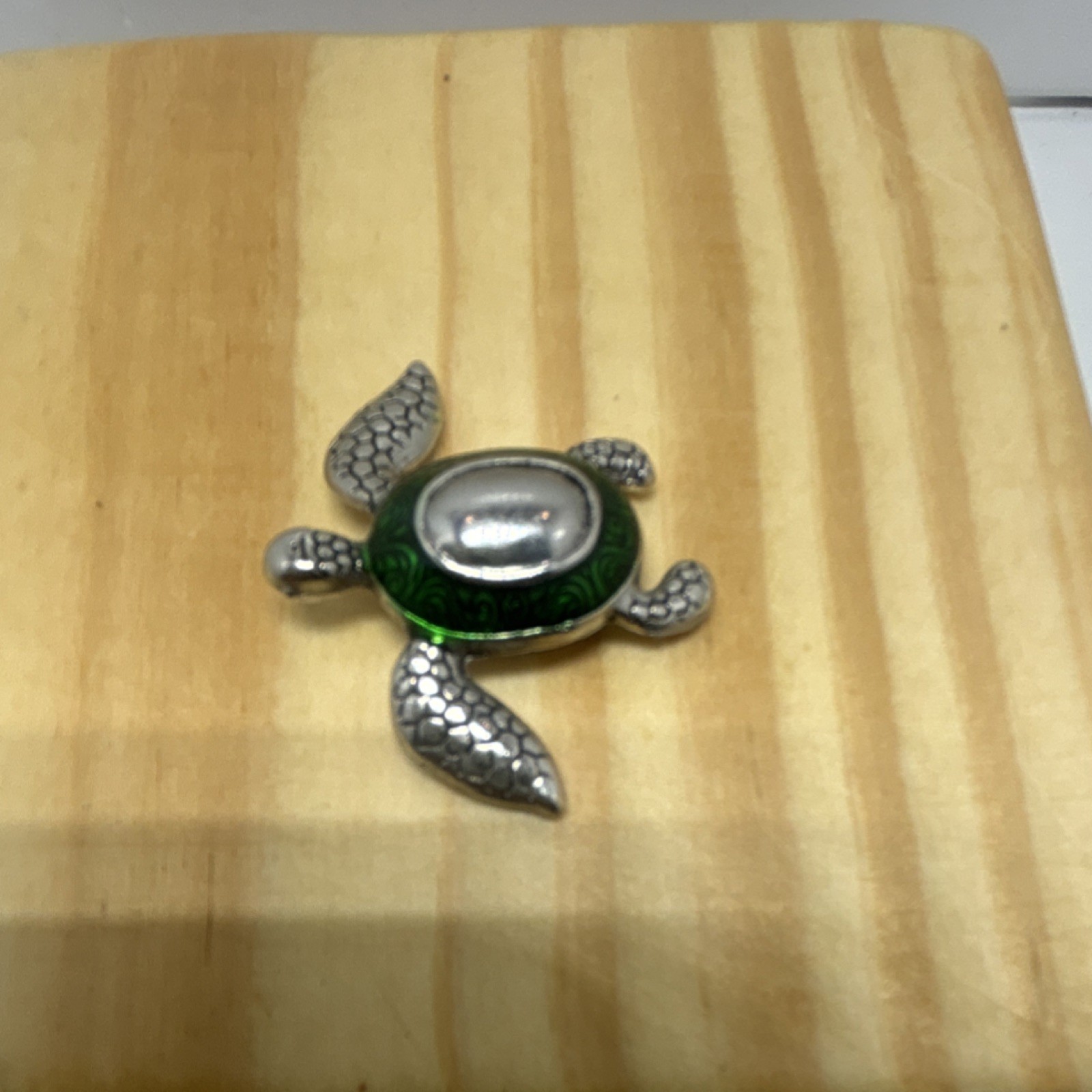 Metal turtle figurine with green and silver shell.(not jewelry)