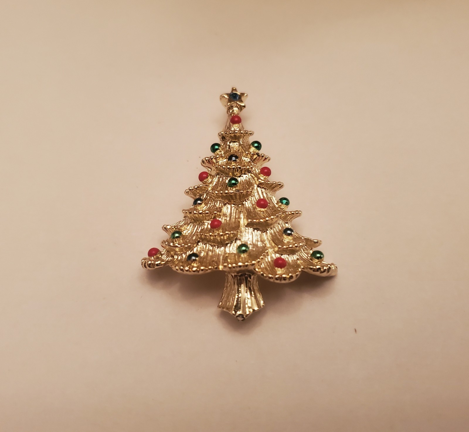 Vintage Holiday Brooch Features Tiered Gold-Tone Branches Decorated With Red And