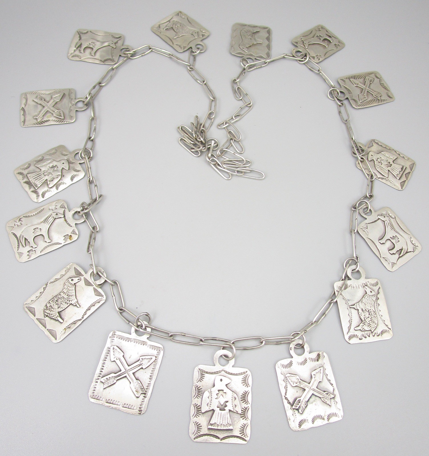 AMAZING 34″ NAVAJO STERLING NECKLACE W/ 15 DOG LUGGAGE TAG DOGTAG CHARMS – 75G