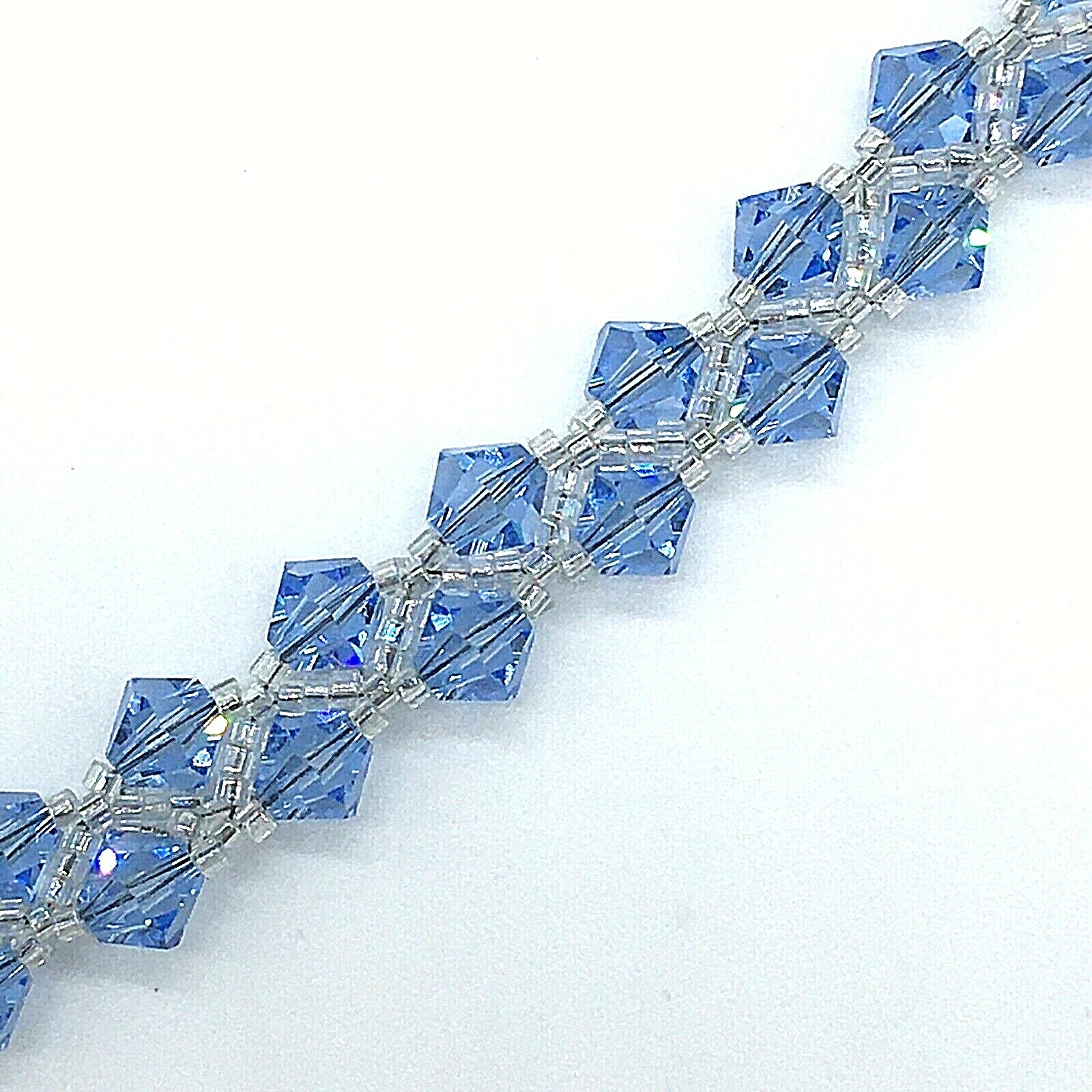 Blue Bicone Glass Crystal Beaded Stretch Bracelet With Ball And Cone Closure