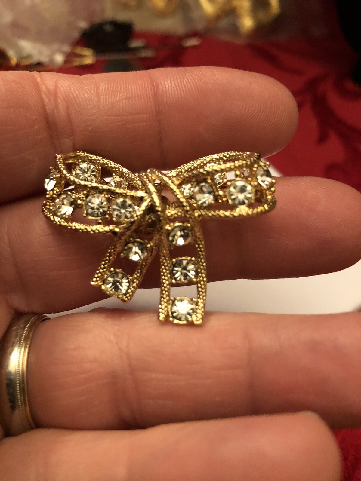 Kenneth Jay Lane KJL Signed Vintage Gold Tone Ribbon Brooch with Rhinestones