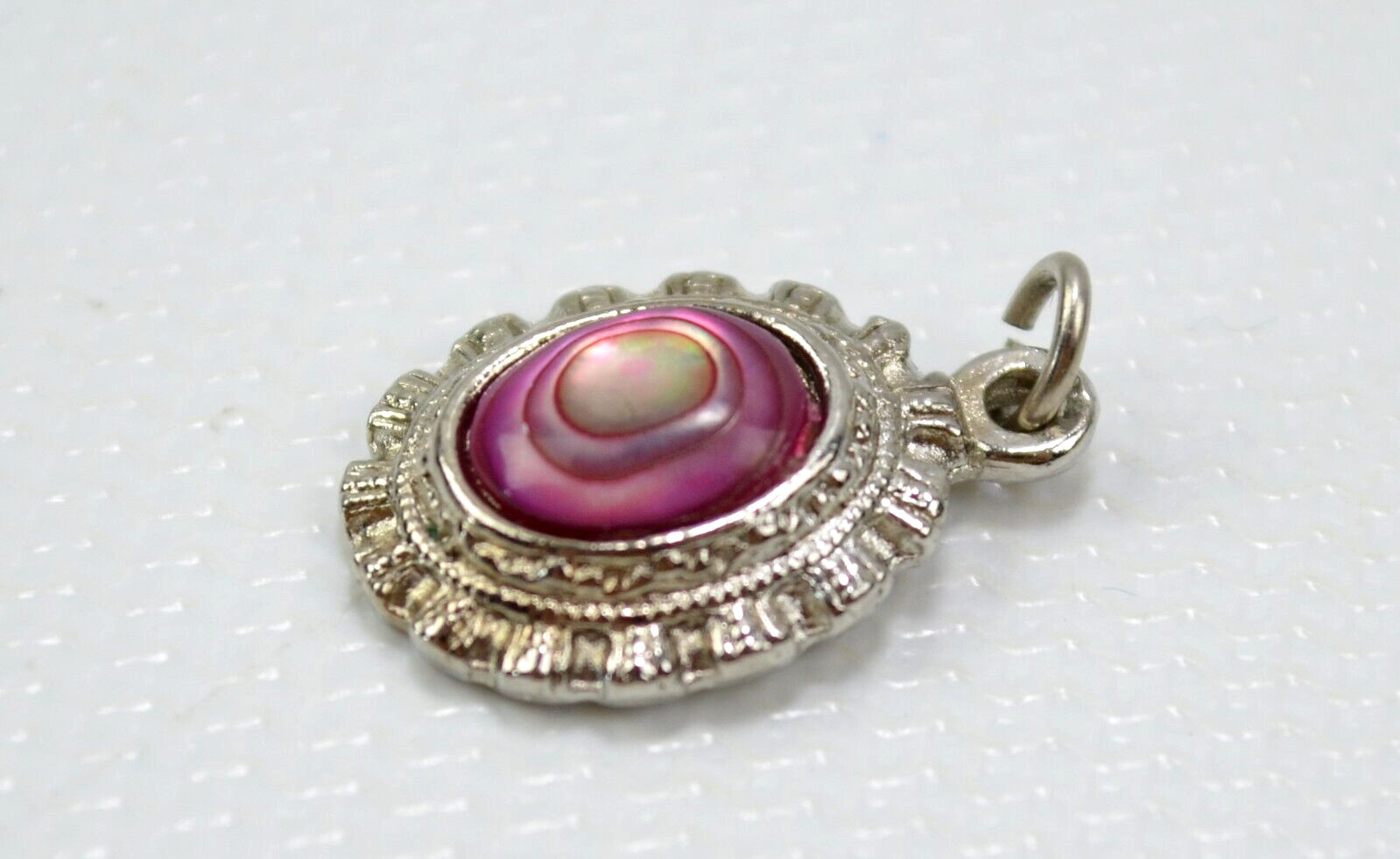 Vintage Small Pink Stone Silver Toned Pendant .75″ x .50″