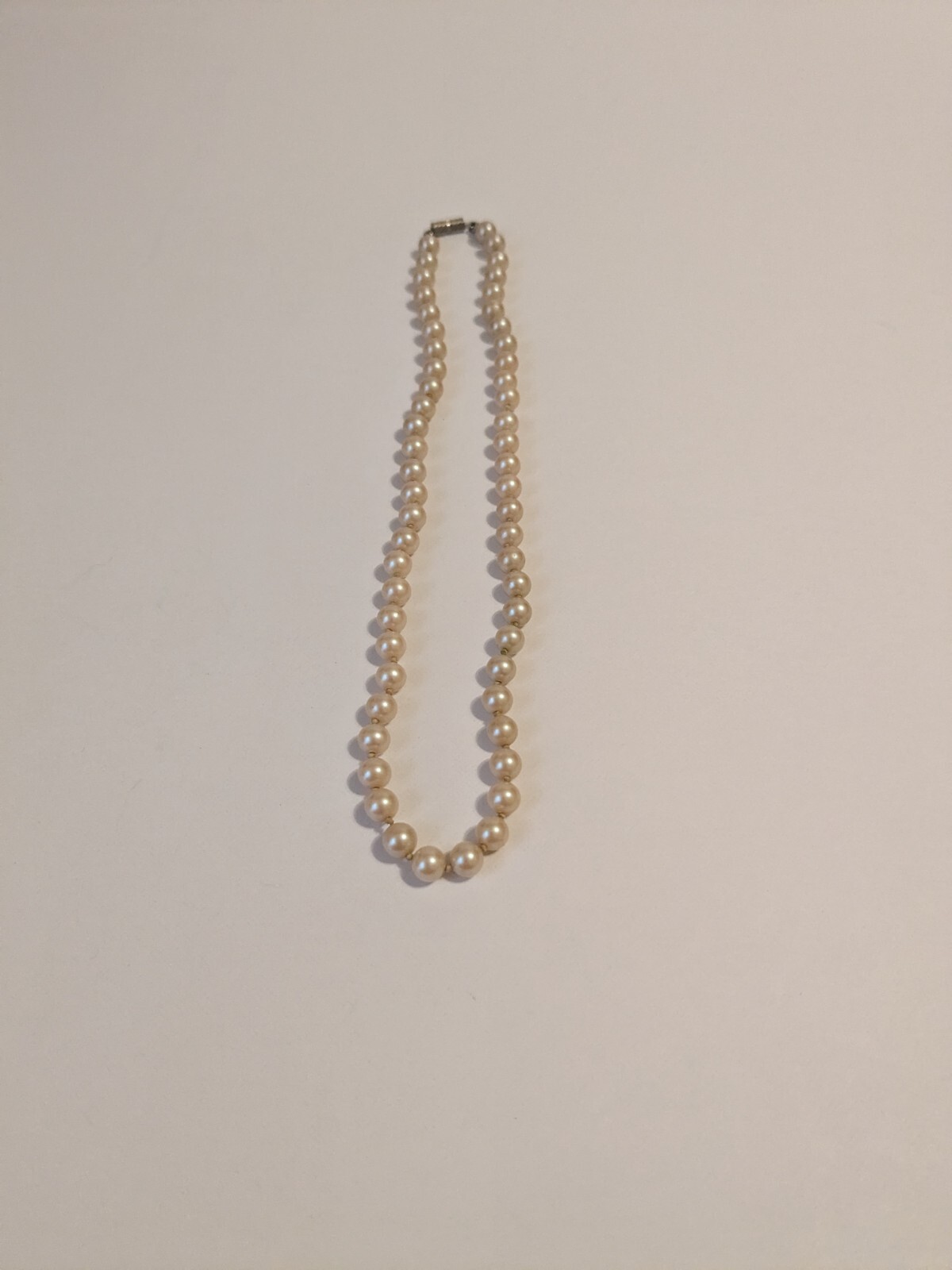 Faux Pearl Vintage Hand Knotted Necklace. Champagne. Barrel Closure 15″.