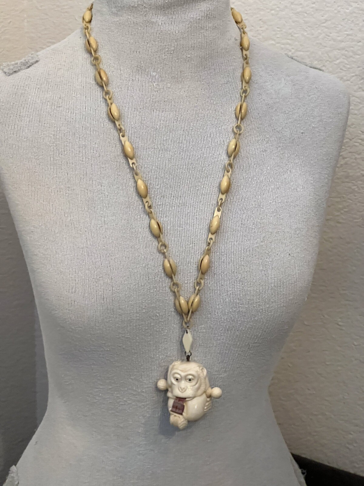 ANTIQUE ART DECO MONKEY NECKLACE TAPE MEASURE CELLULOID CHAIN PENDANT WHIMSICAL