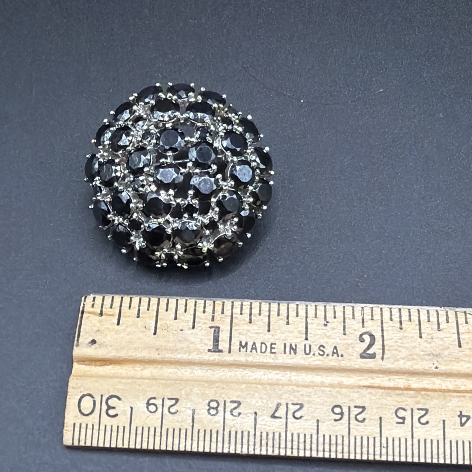 Vintage Warner Black Faceted Rhinestone Cluster Round Domed Brooch Gold Tone