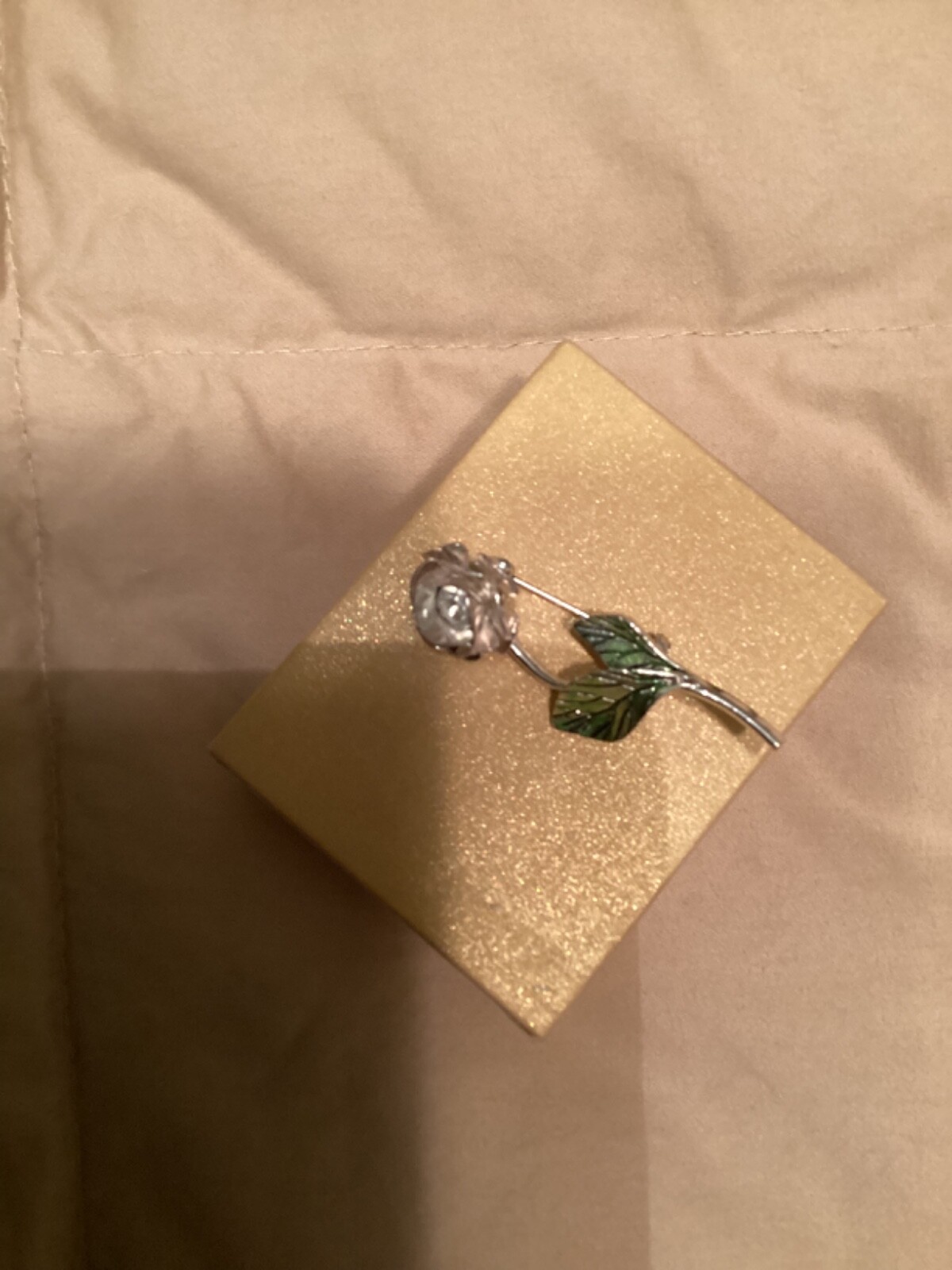 Avon vintage pin clear looking center with green leaves small almost 2” detailed