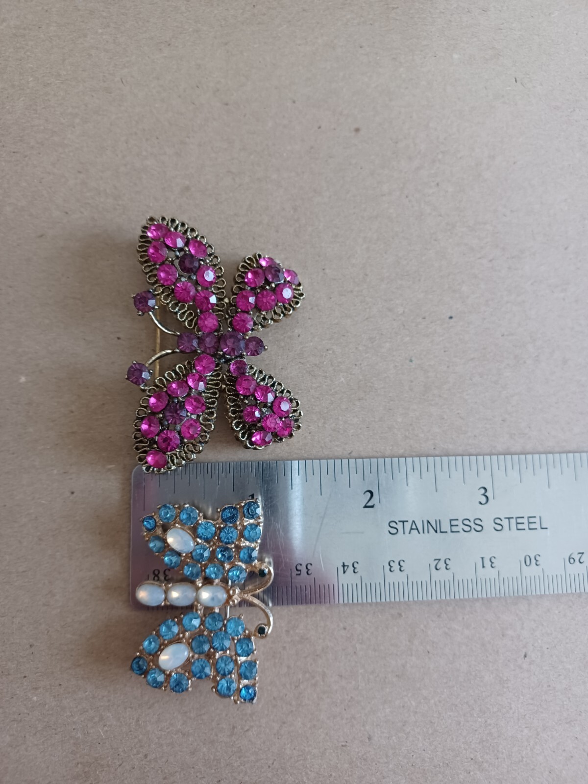 Vintage Lot Of 2 Rhinestone Butterfly Pins Brooches Pink Purple And Blue Milky