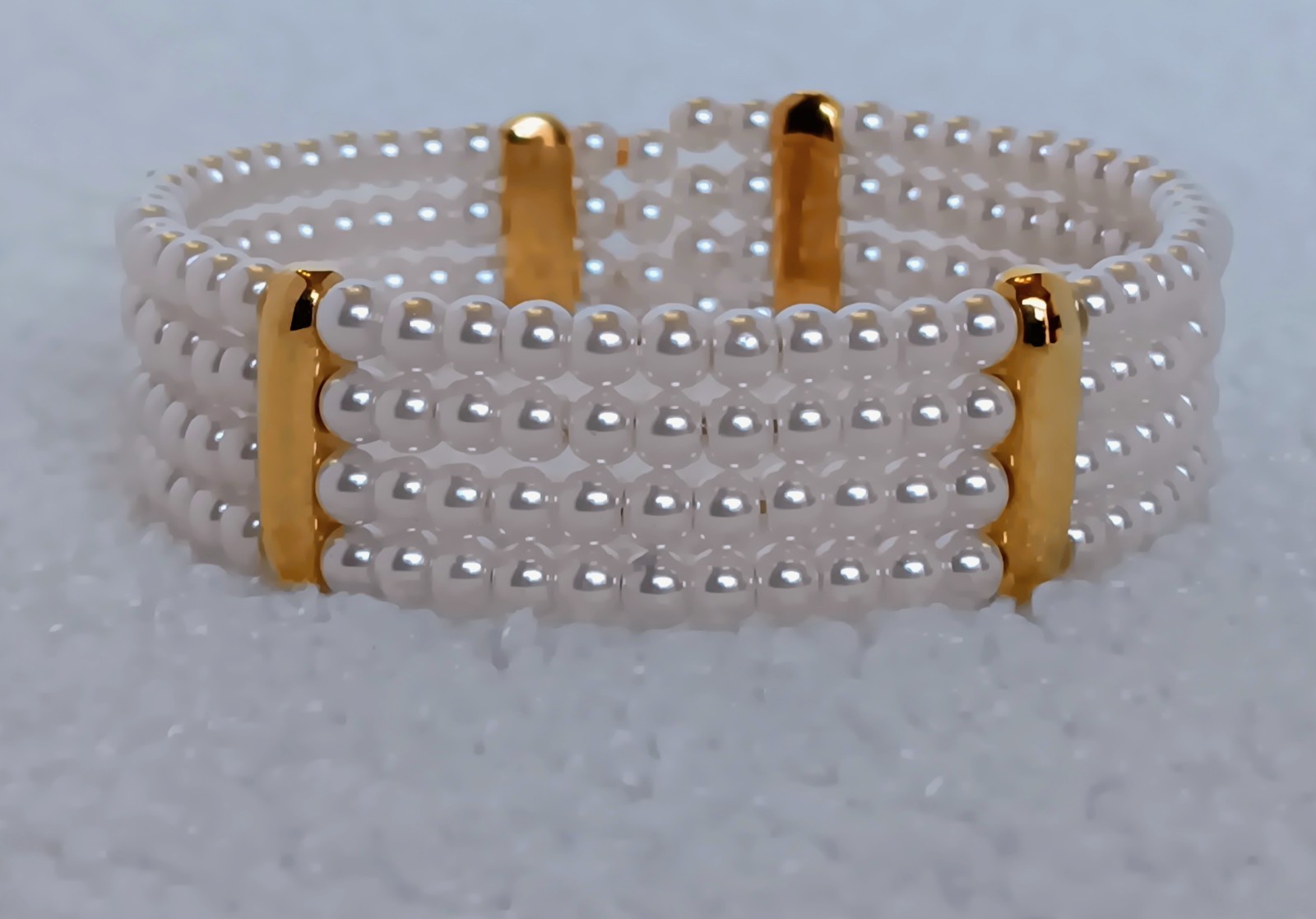 Vintage 4 Strand Faux Pearl Goldtone Tension Cuff Bracelet 7.5 in