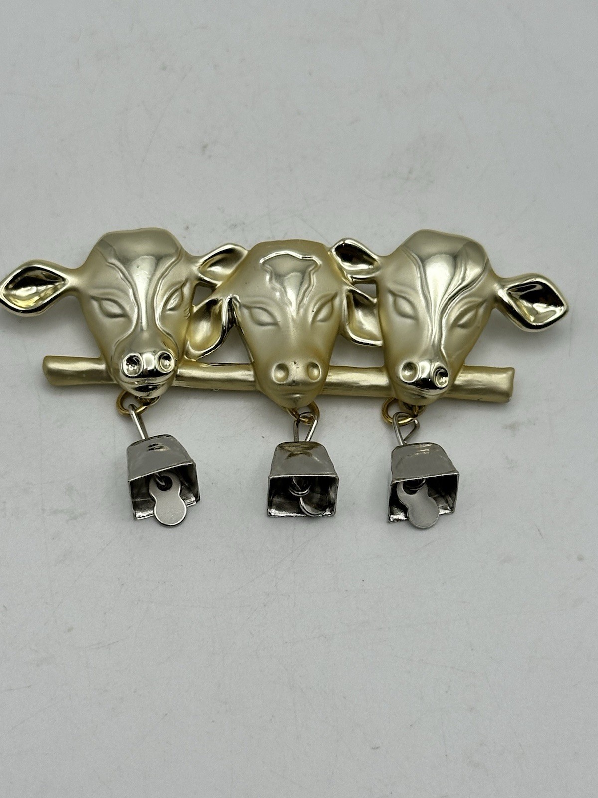 Vintage Gold Tone 3 Cow Brooch Pin with Dangling Silver Tone Bells Signed AJC