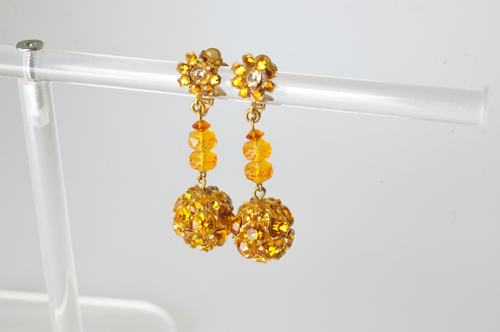 Vtg signed Miriam Haskell rhinestone Gold Tone drop clip earrings amber color