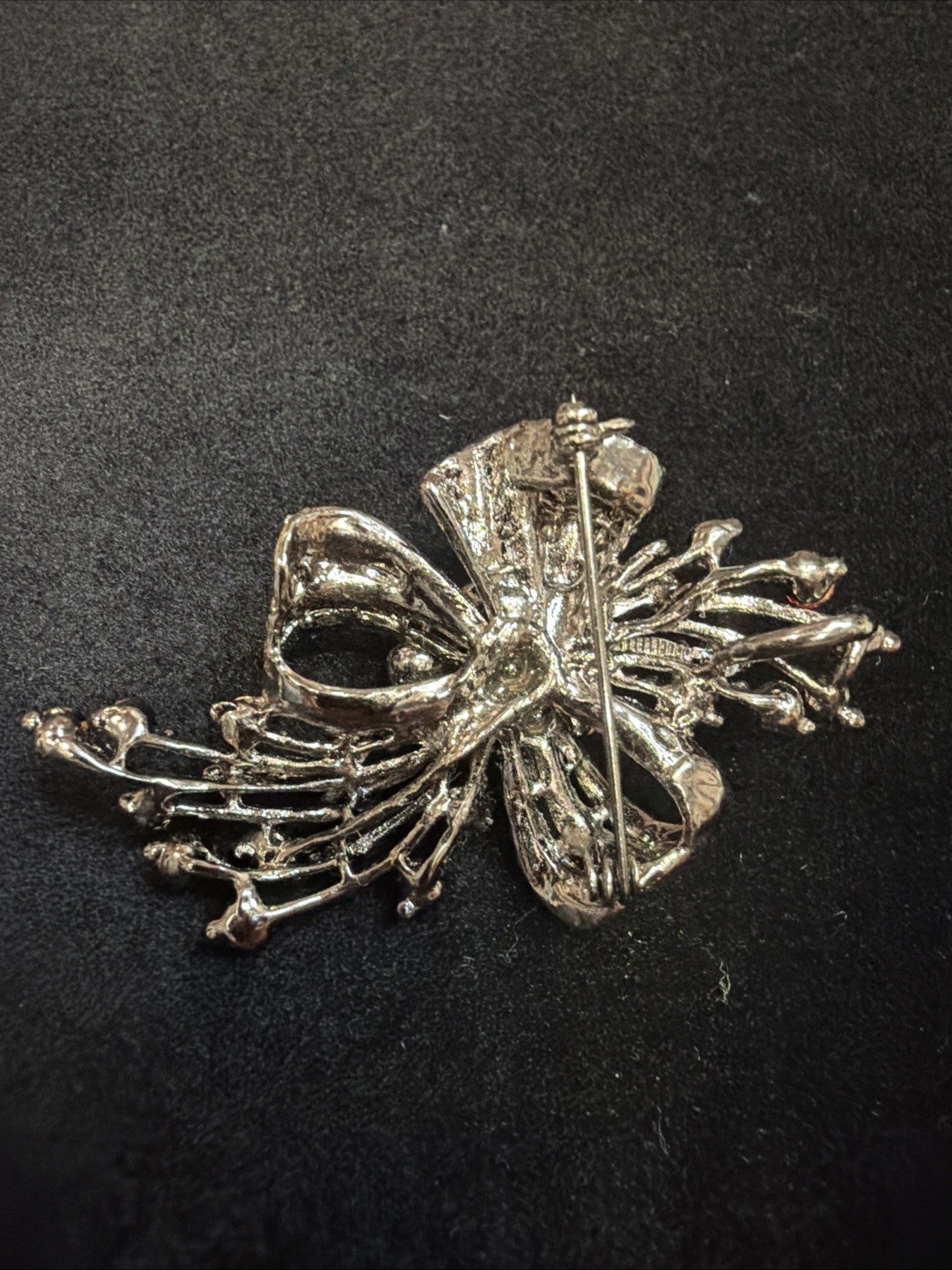 Vintage Bow Brooch Gunmetal-toned With Red Iridescent Rhinestones