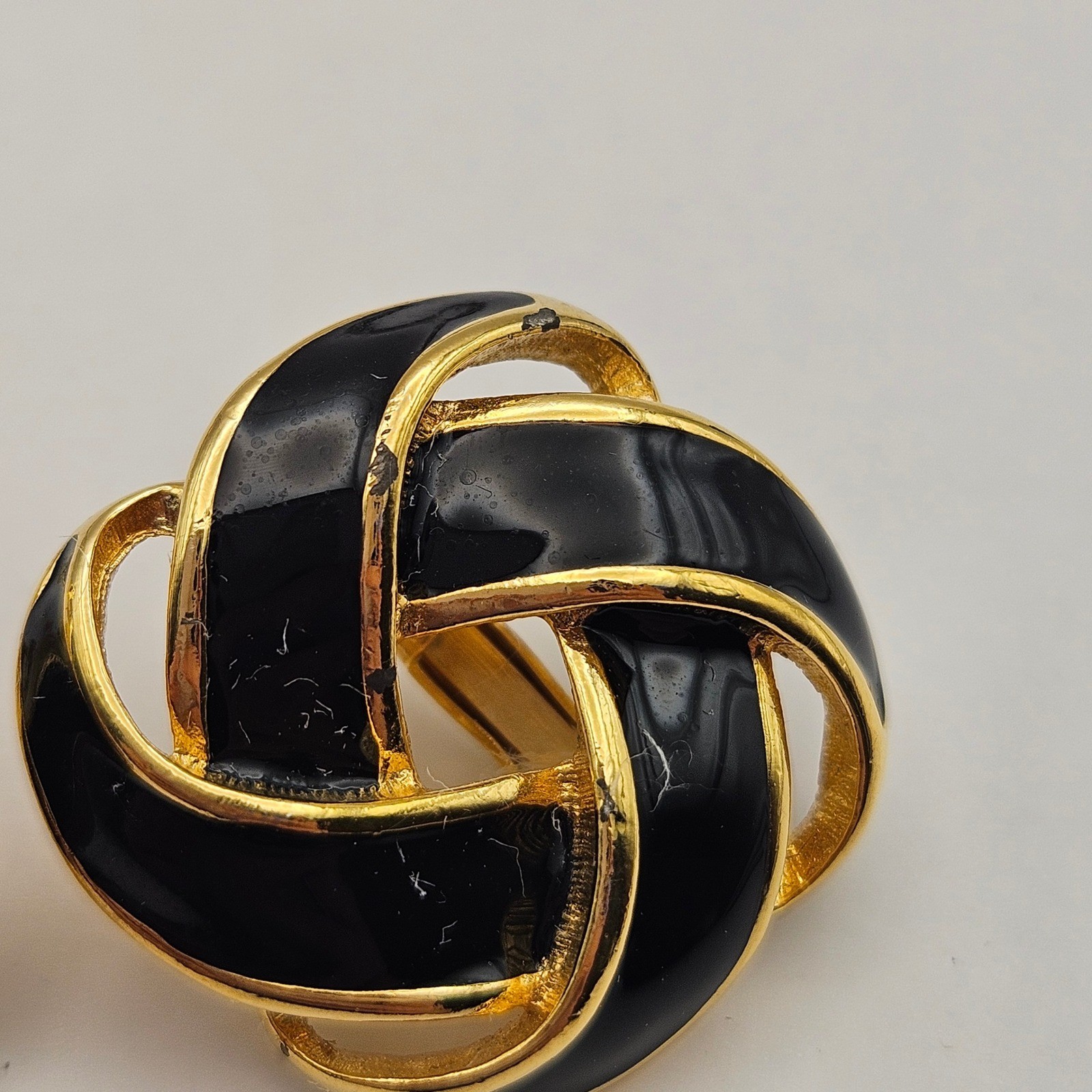 Napier Vintage Black Enamel Gold Tone Interlocking Knot Screw Back Clip Earrings