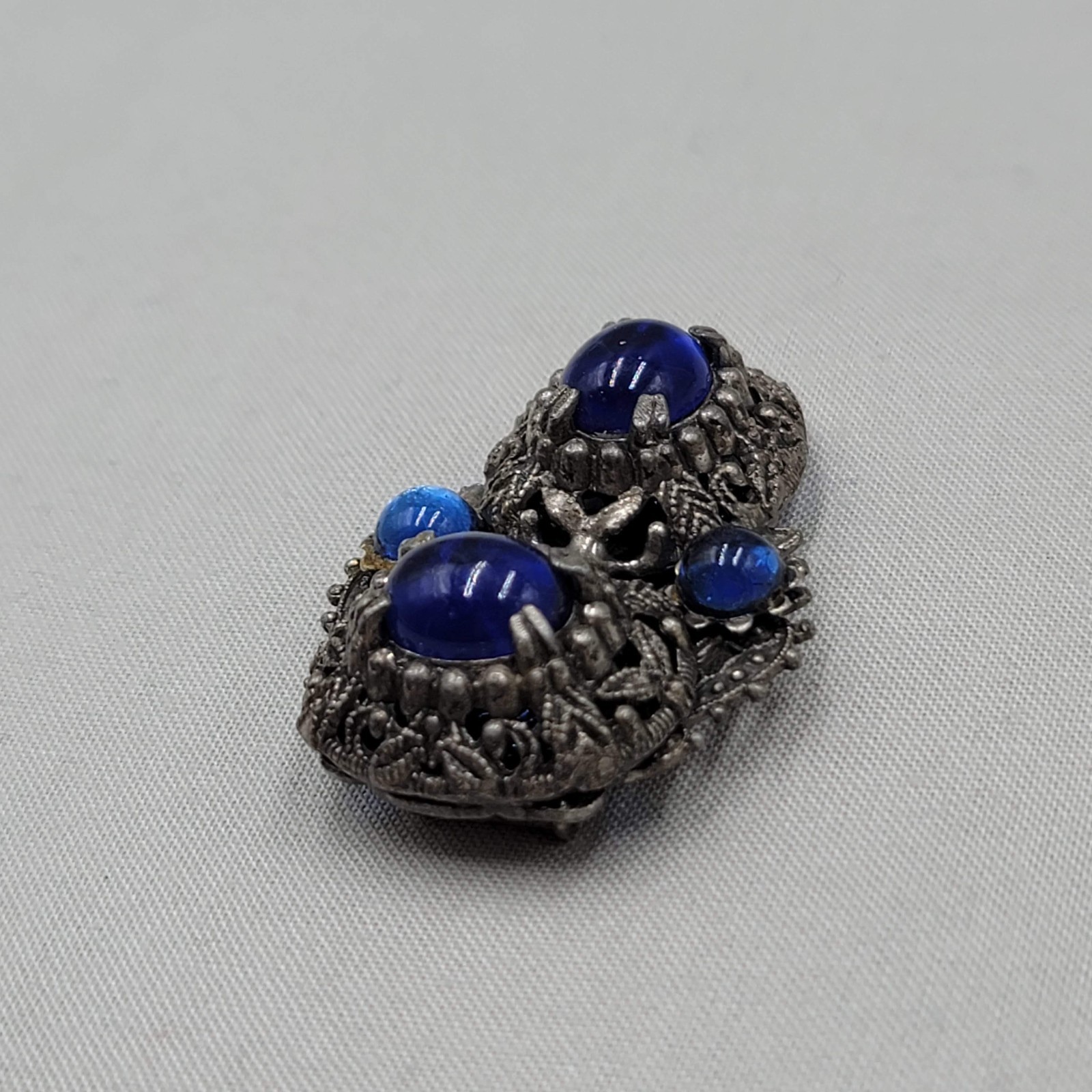 Vintage Blue Cabochon Dress Clip Dark Gray Embossed 2″