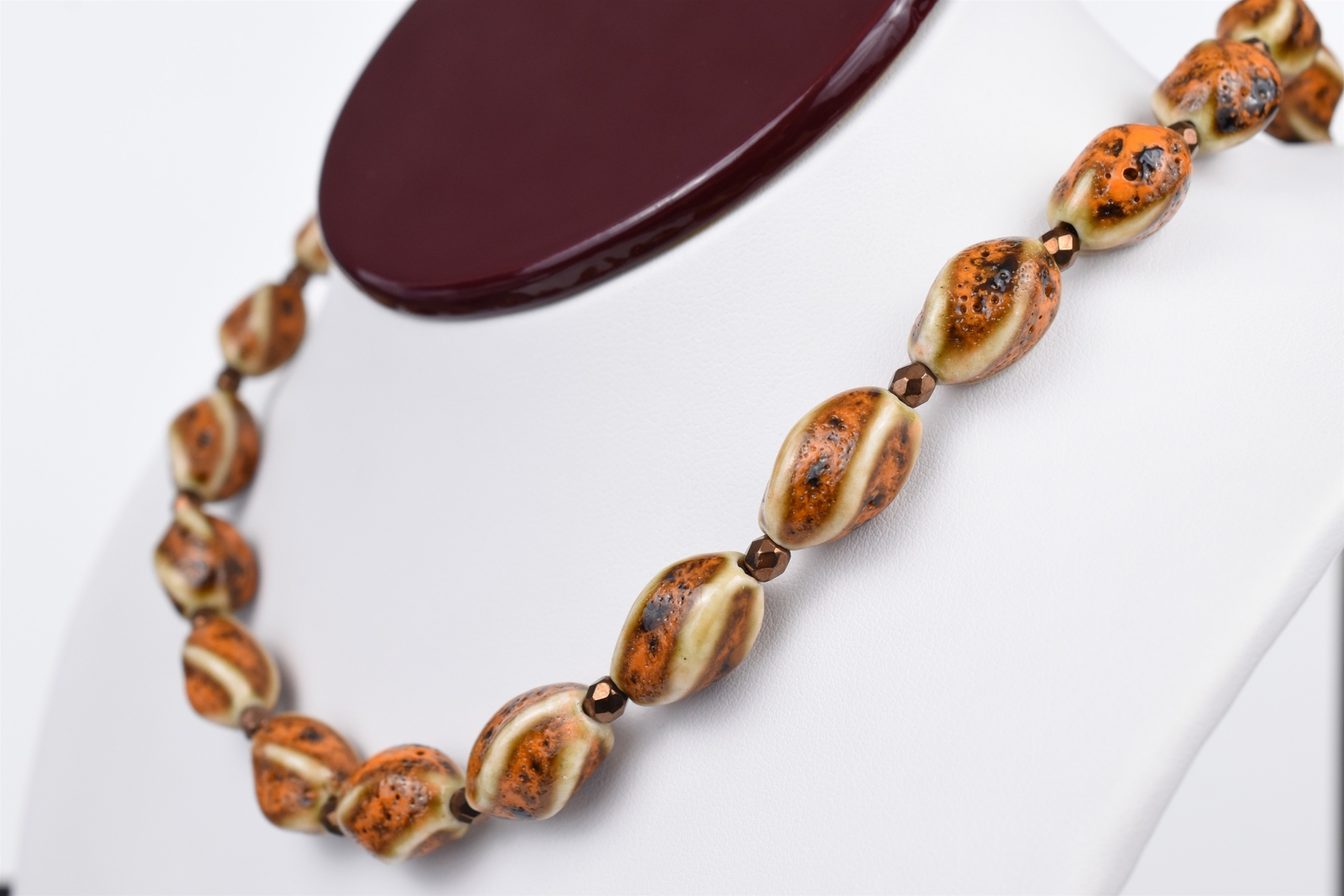 Gold Plated 21″ Cream Brown Orange Twist Ceramic Necklace w/ Bronze Spacers