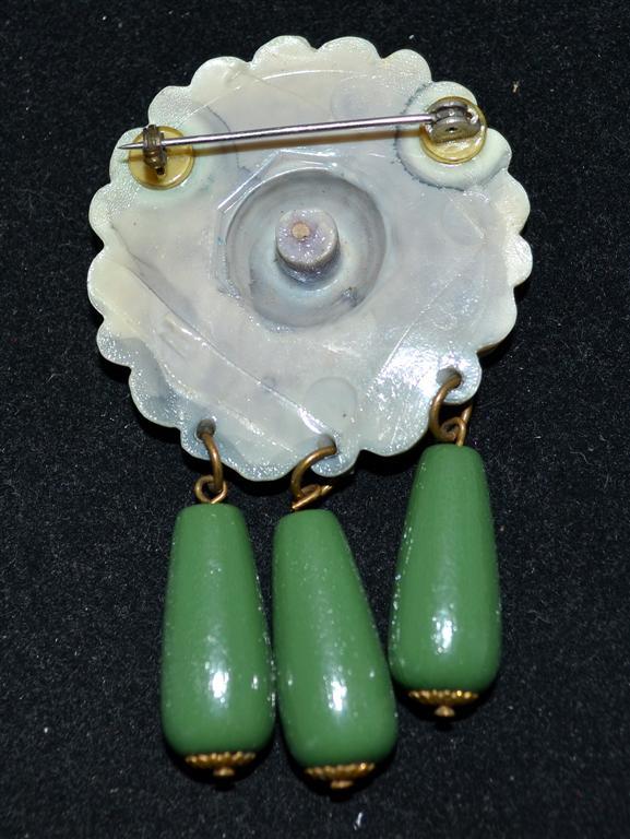 Vintage Cream & Purple Early Plastic Flower Pin with 3 Dark Green Wood Tassels