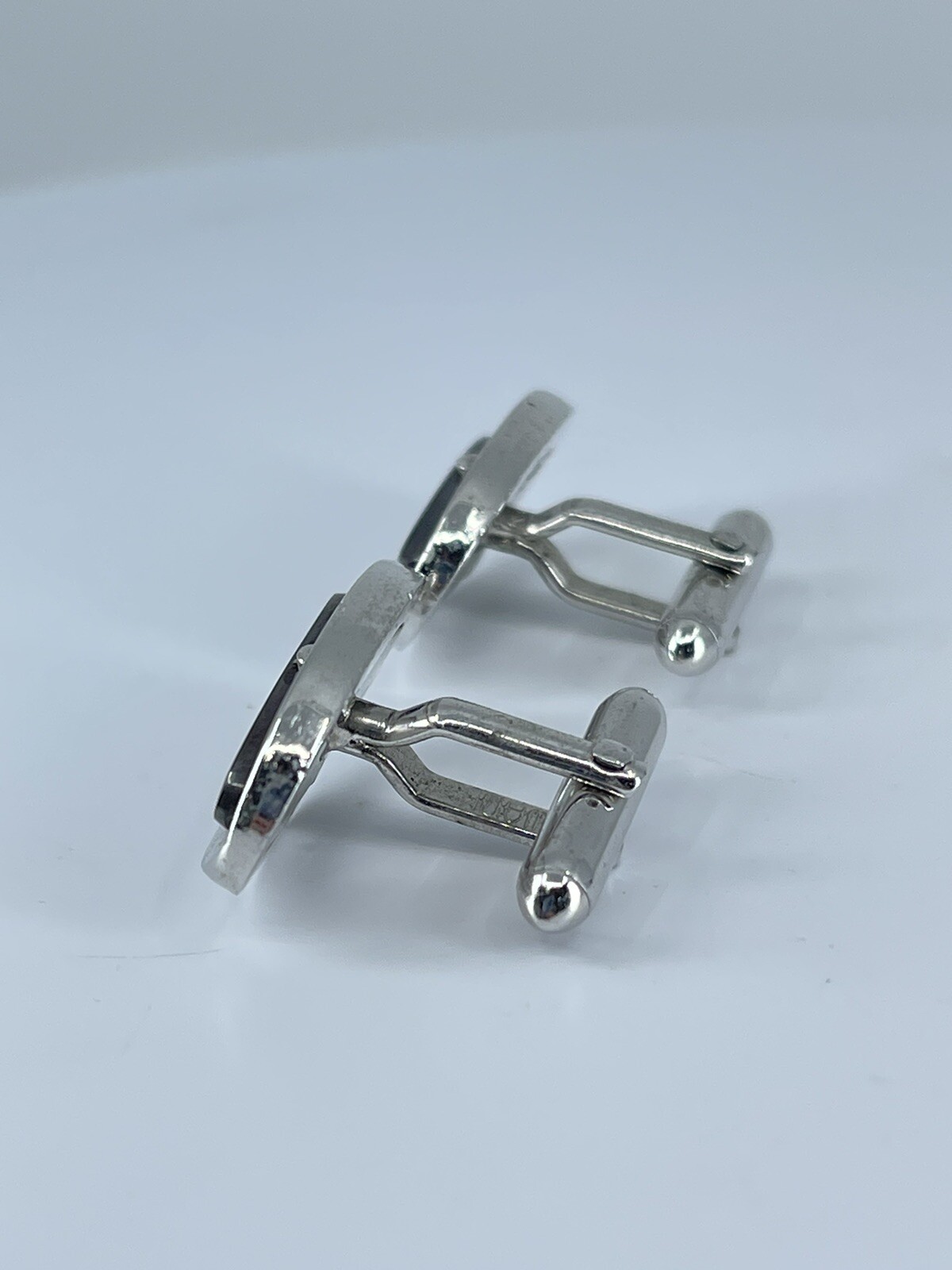 Vintage Swank hematite cufflinks long oval open silver tone design 3/4″