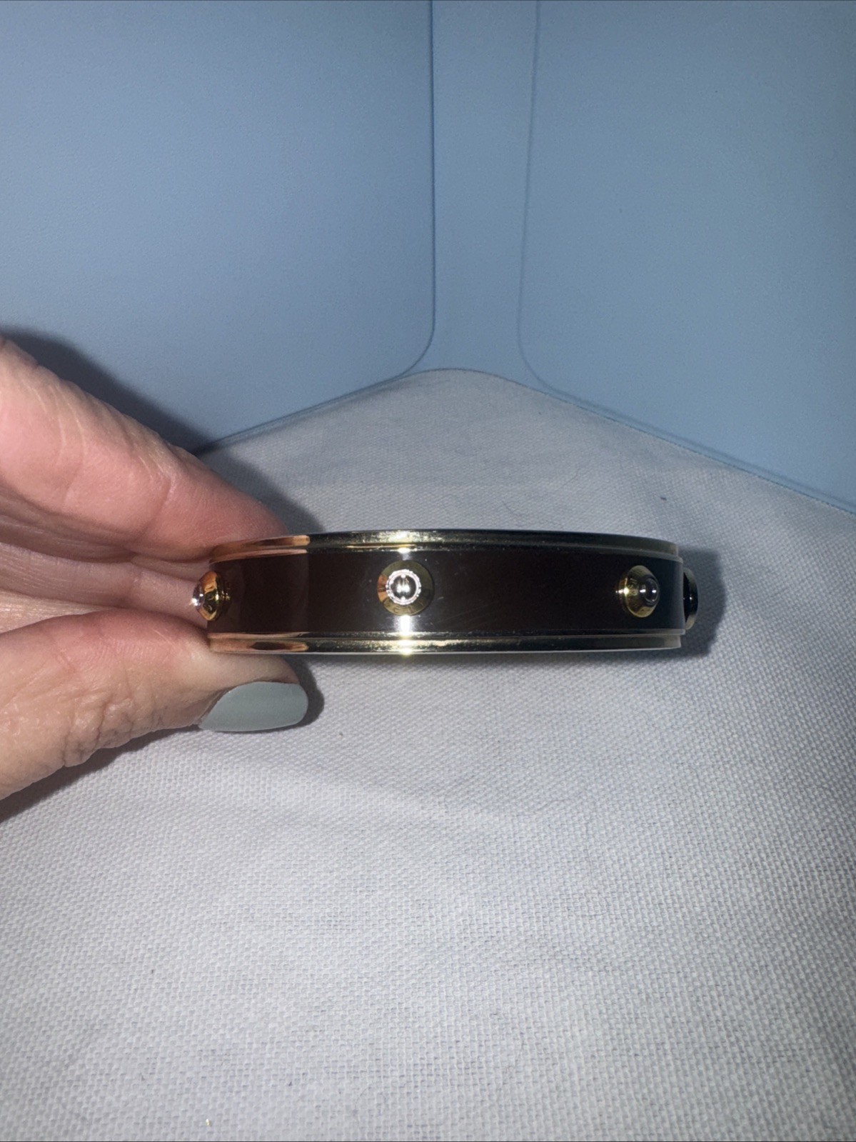 New HENRI BENDEL Goldtone Rivet w Logo Brown Metal Bangle Bracelet