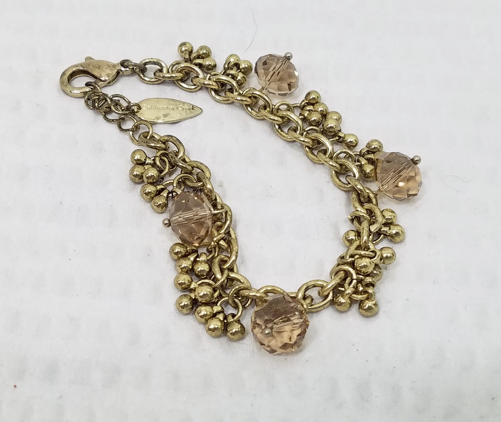 VTG Signed Coldwater Creek Taupe Crystal Bead And Gold Tone Charm Style Bracelet