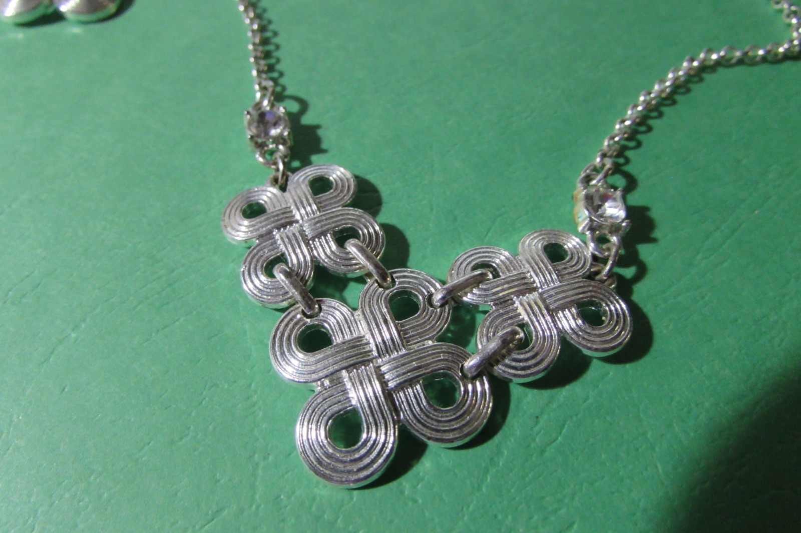 LMN 17″ necklace and almost 2″ pierced earring set silvertone swirl w/rhinestone