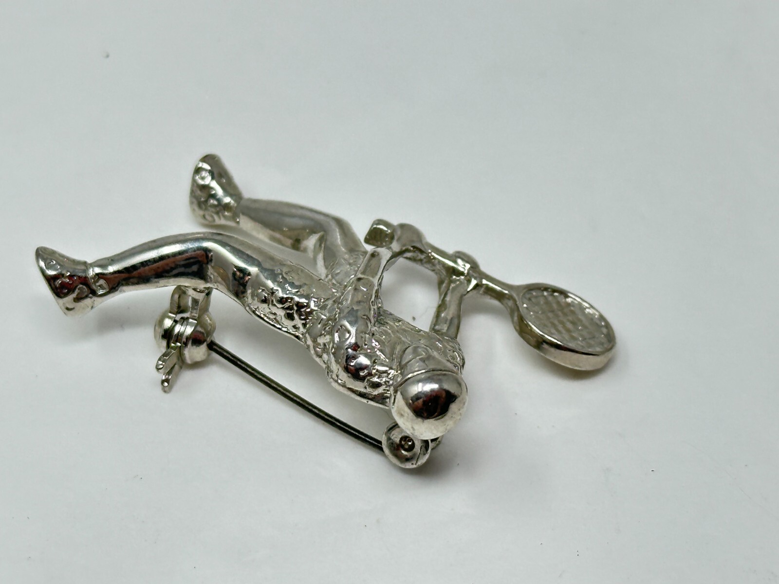 Vintage Silvertone Person Playing Tennis Brooch Pin