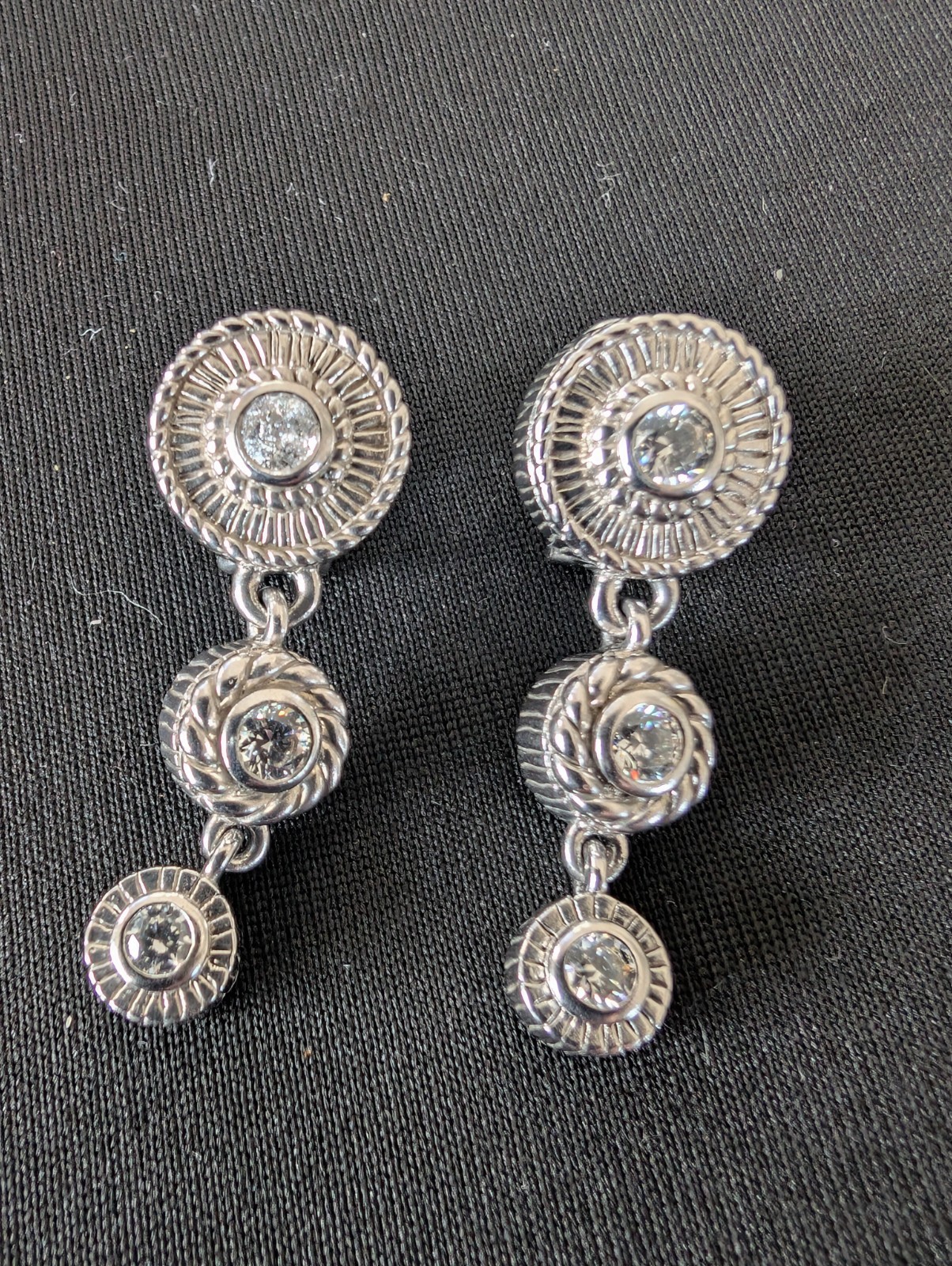 JUDITH RIPKA 925 Silver Twist Dangle Earrings
