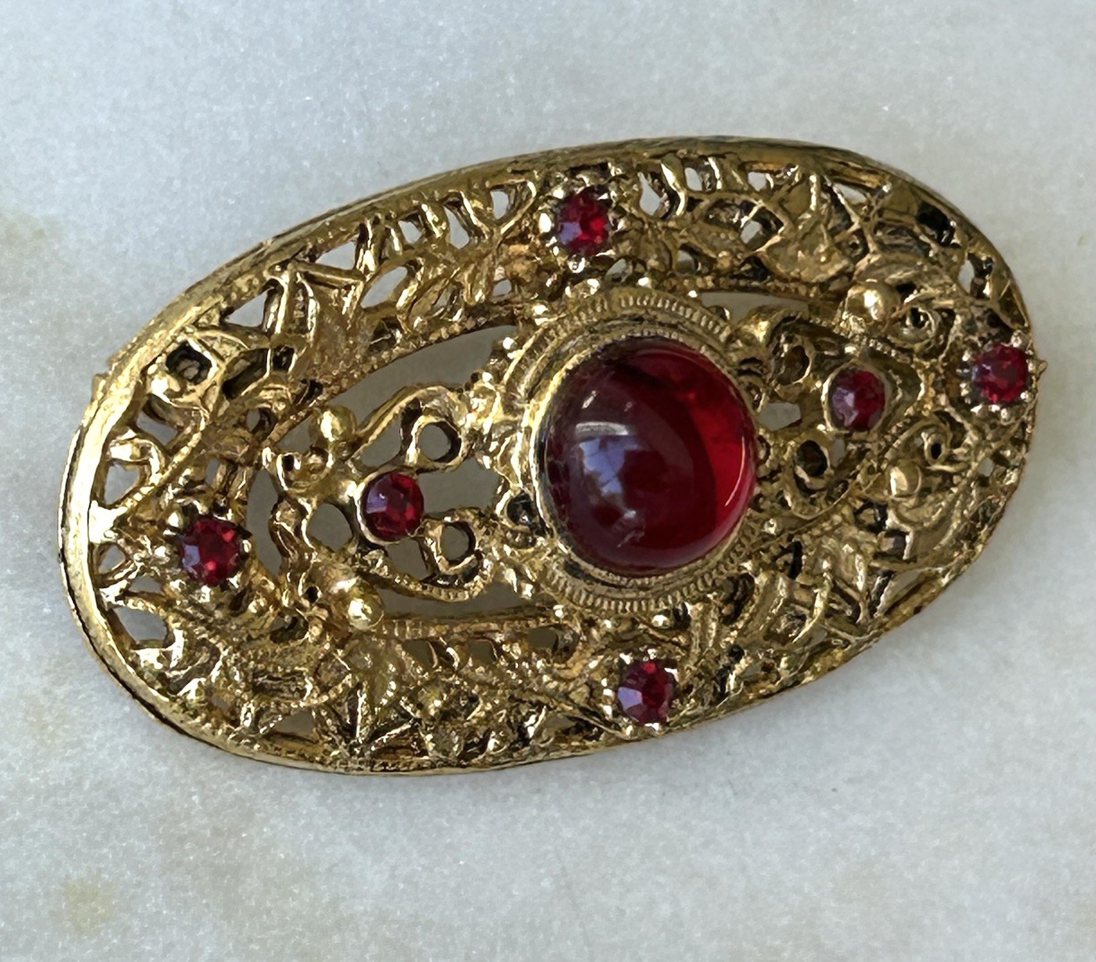 Vintage Victorian Revival Red Cabochon Rhinestone Gold Tone Filigree Brooch Pin