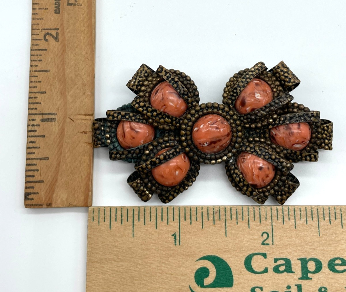 VTG Art Deco Textured Brass Ribbon Faux Coral Cabochon Brooch 2.5″