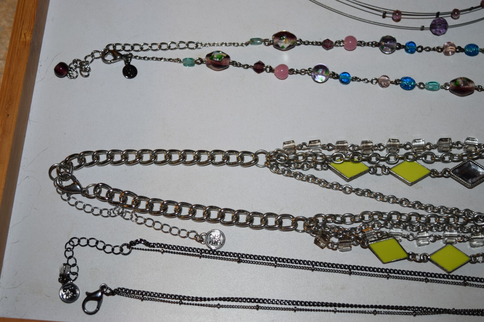 Vintage to now lot of 4-2 VJ-2 not sure of symbol chain necklaces