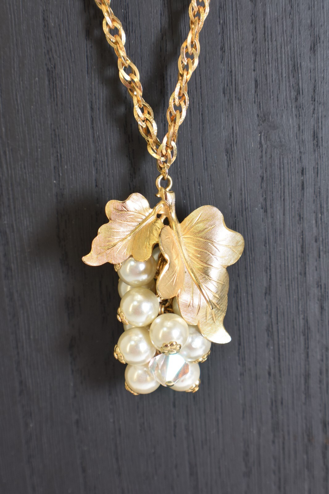 Vintage unsigned Bunch of Grapes necklace, gold tone, faux pearl & crystals 20″